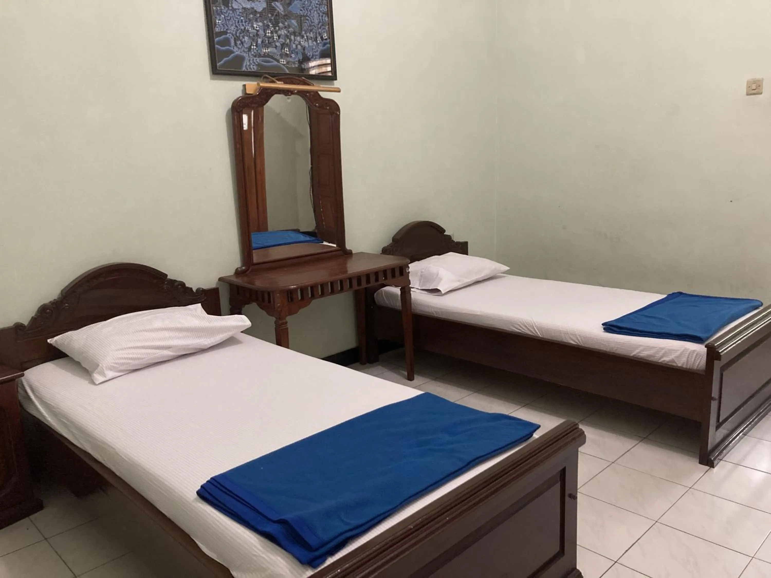 Bed in Hotel Garuda Syariah near Alun Alun Banjarnegara