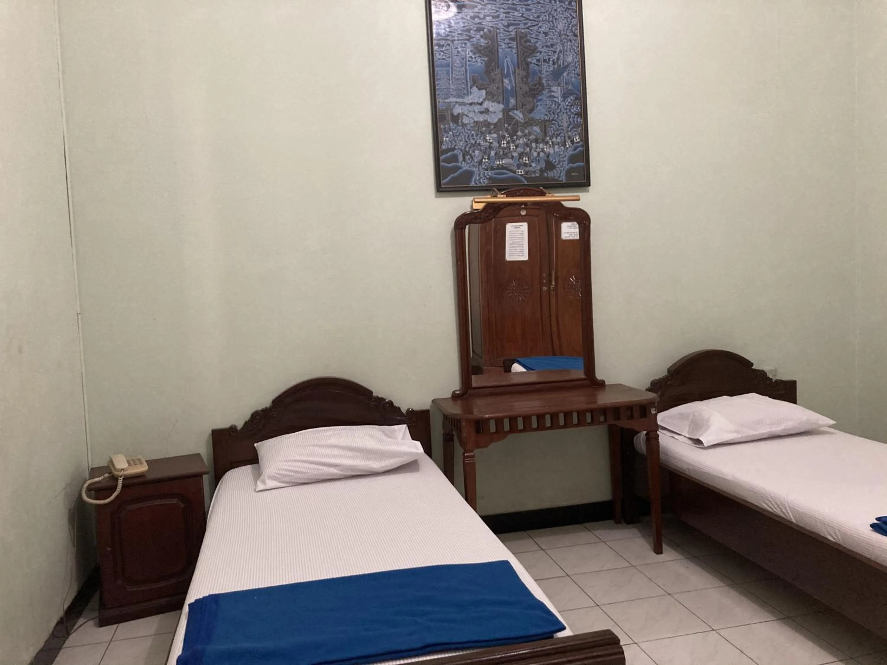 Bed in Hotel Garuda Syariah near Alun Alun Banjarnegara