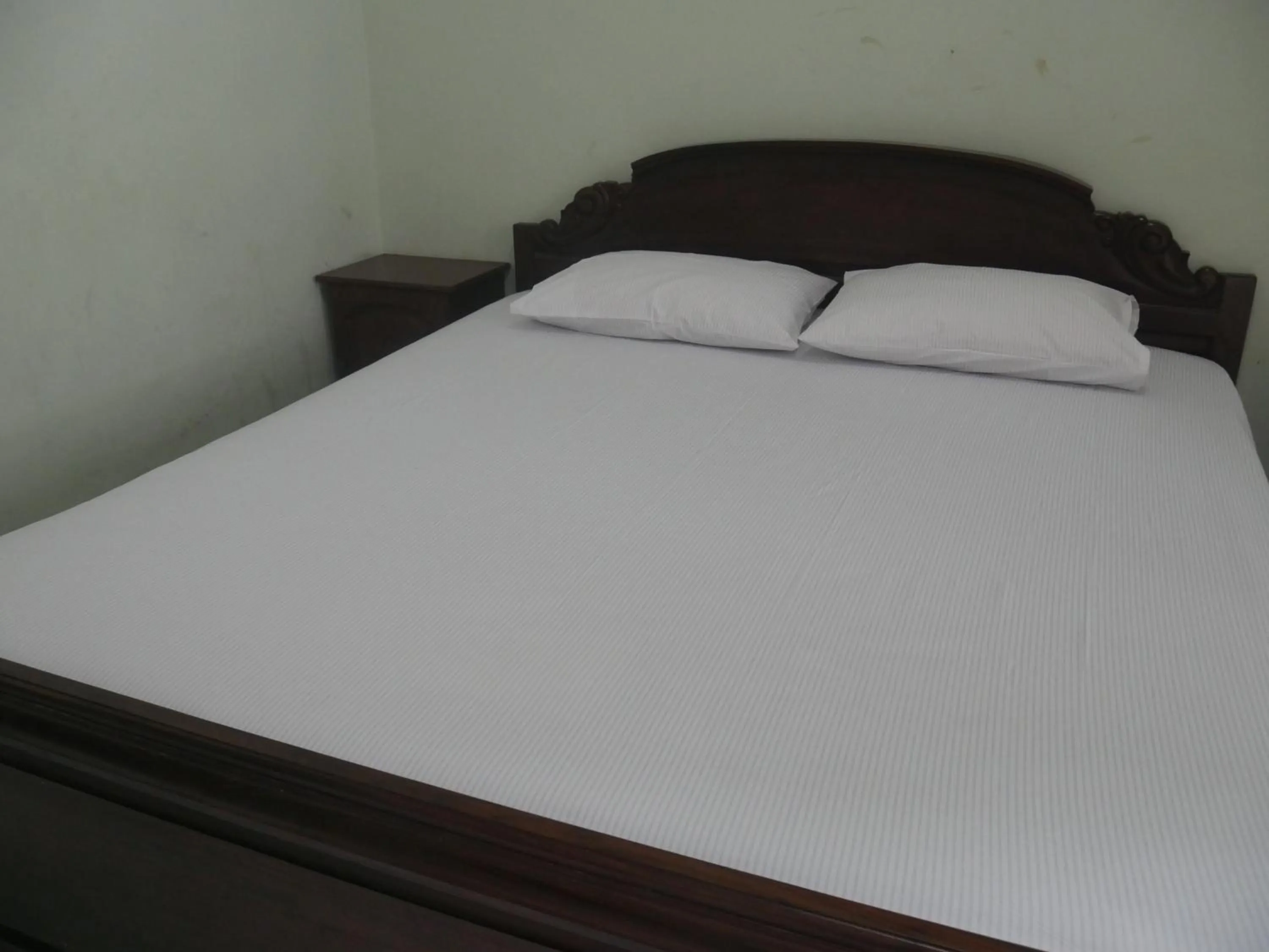 Bed in Hotel Garuda Syariah near Alun Alun Banjarnegara