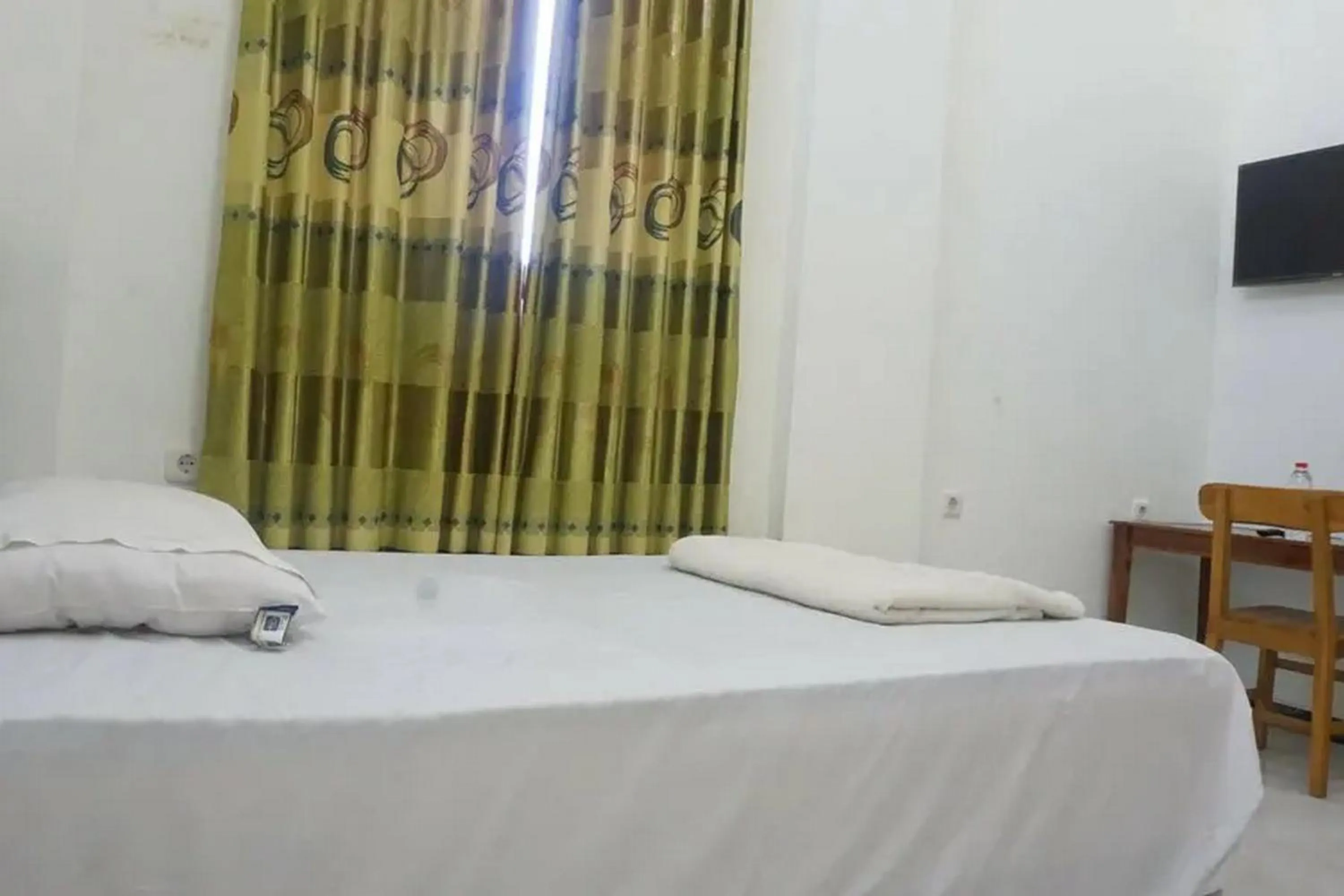 Bedroom, Bed in Griya Mataram Kotagede Mitra RedDoorz