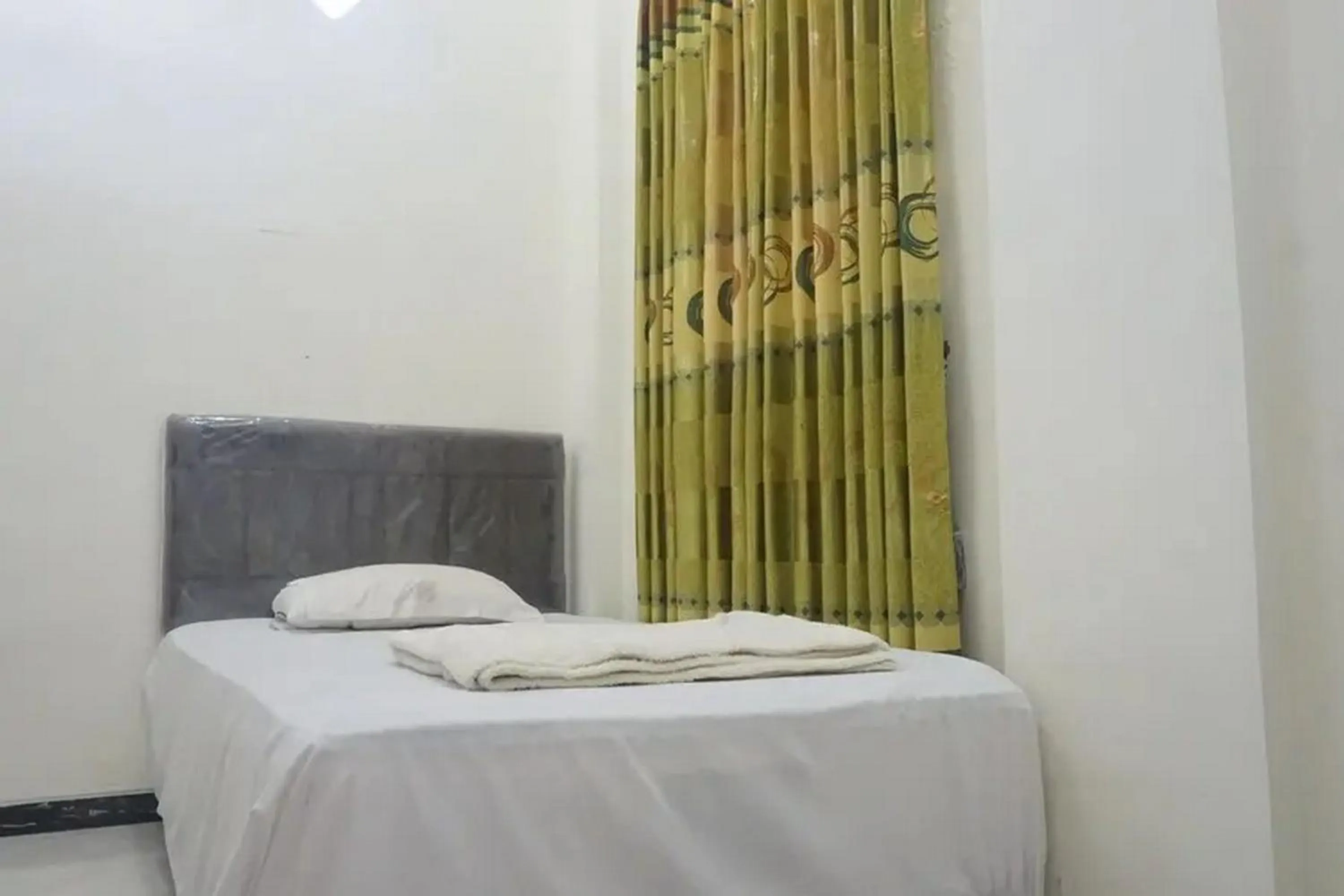 Bedroom, Bed in Griya Mataram Kotagede Mitra RedDoorz