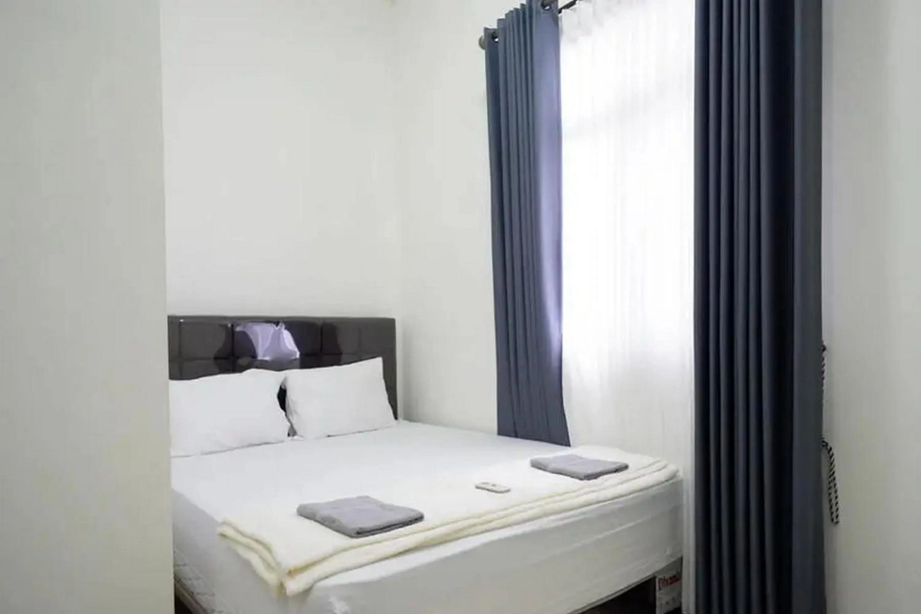 Bedroom, Bed in Griya Mataram Kotagede Mitra RedDoorz