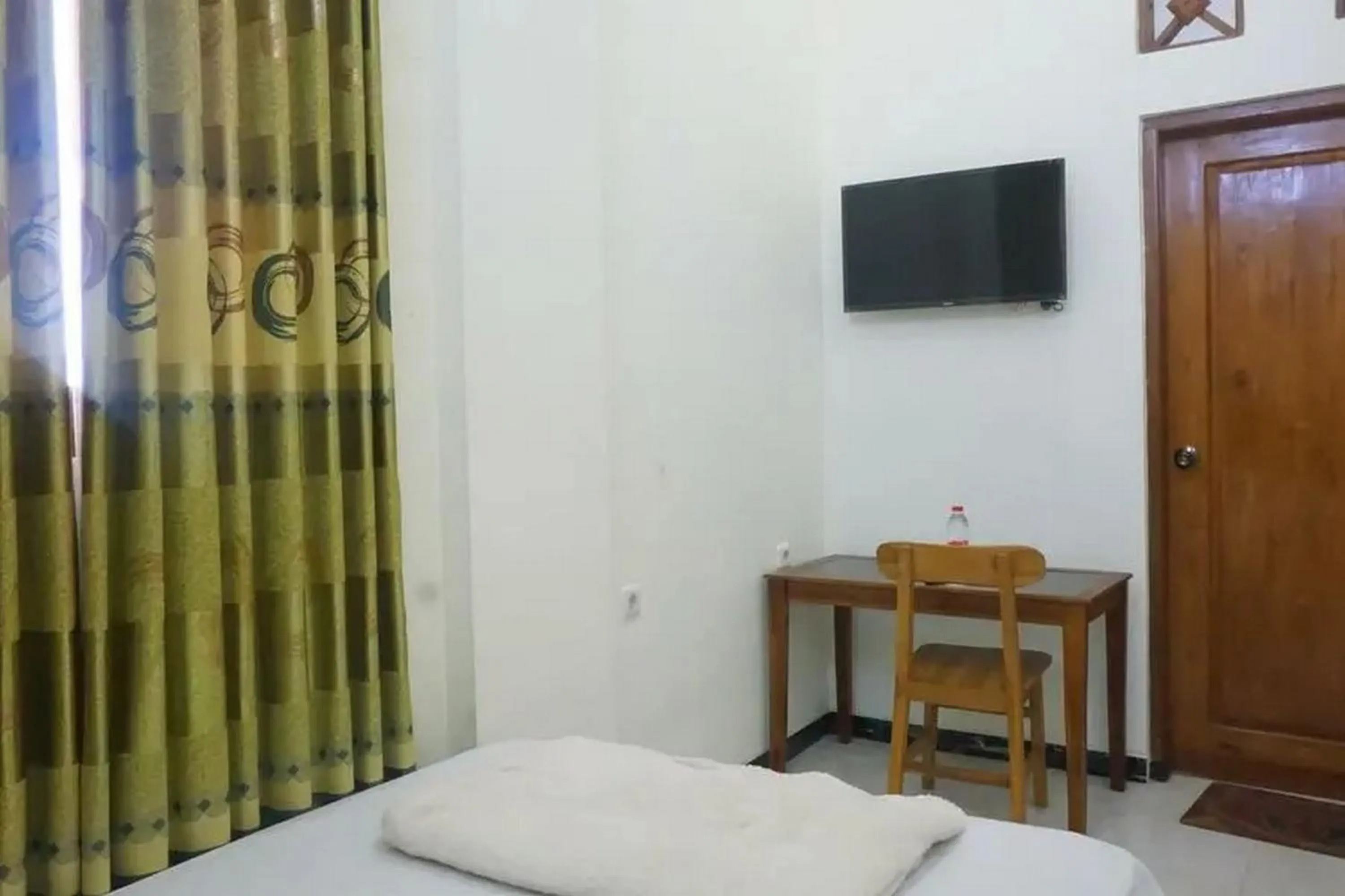 Bedroom, Bed in Griya Mataram Kotagede Mitra RedDoorz