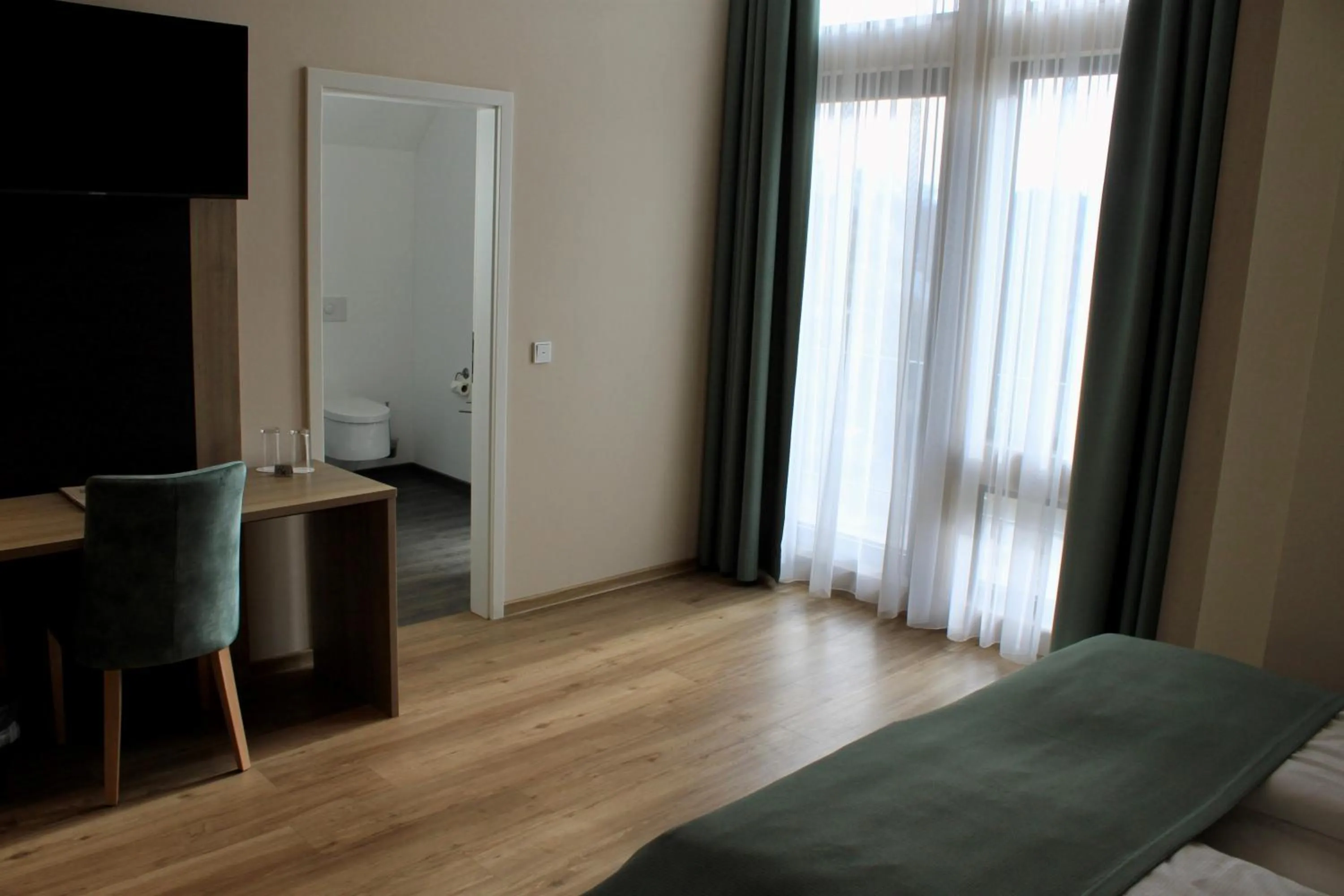 Bed in Troll's Brauhaushotel