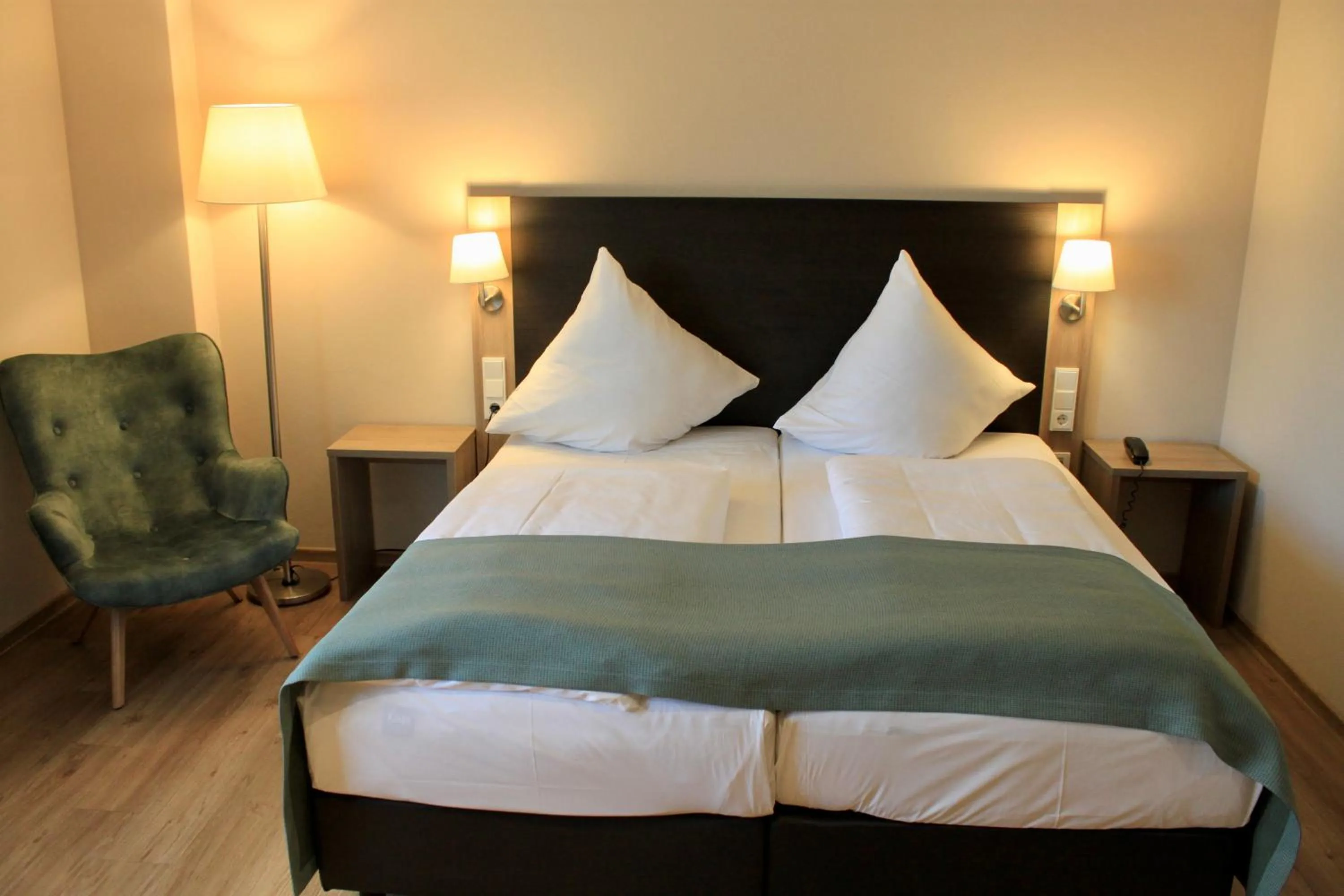 Bed in Troll's Brauhaushotel