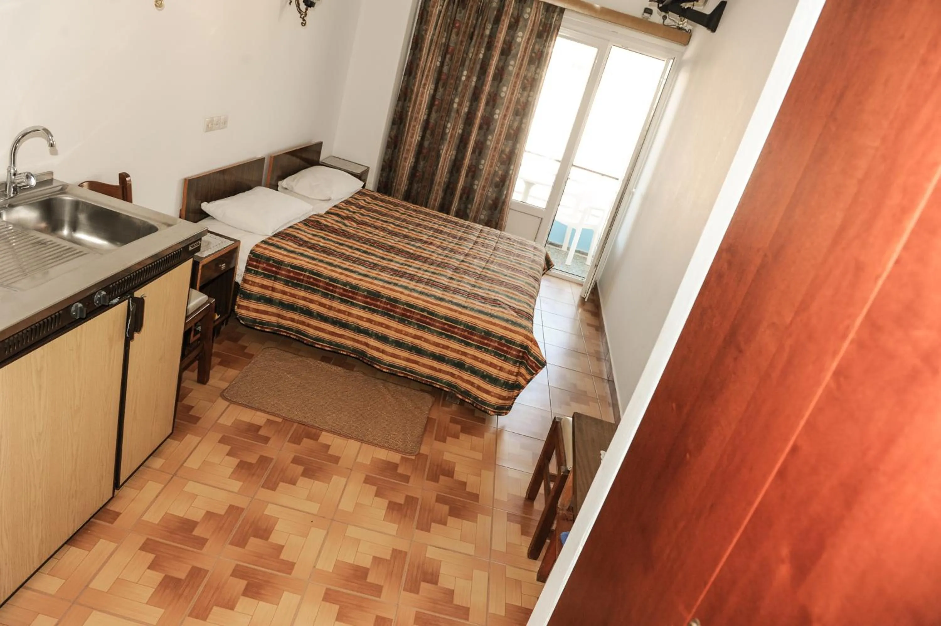 Bed in Hotel Karpathos