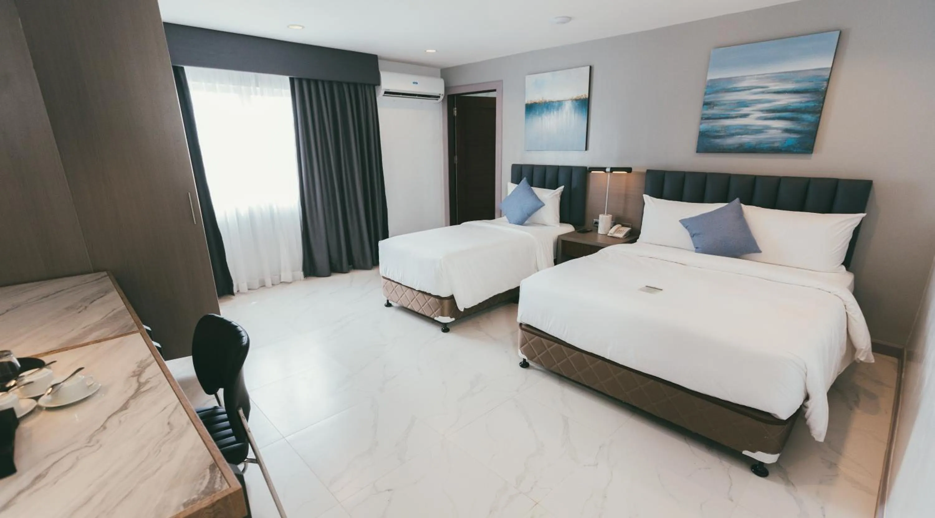 Bed in NS Royal Hotel