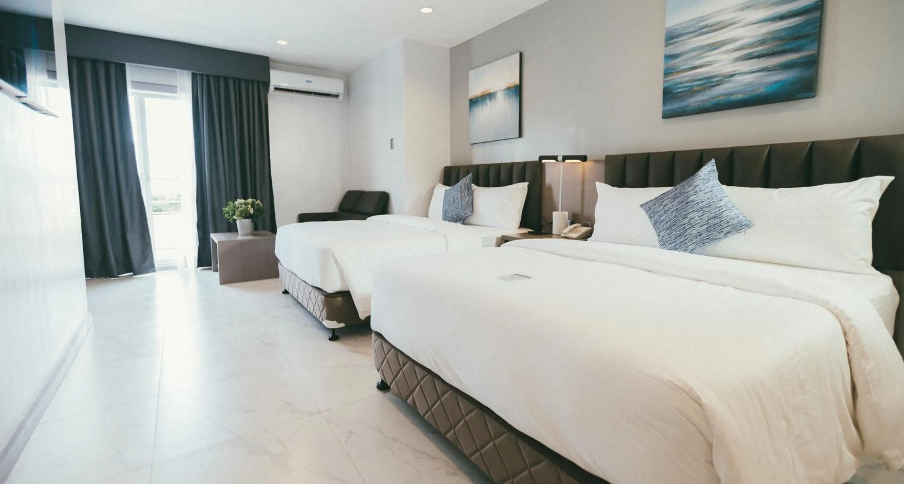 Bed in NS Royal Hotel