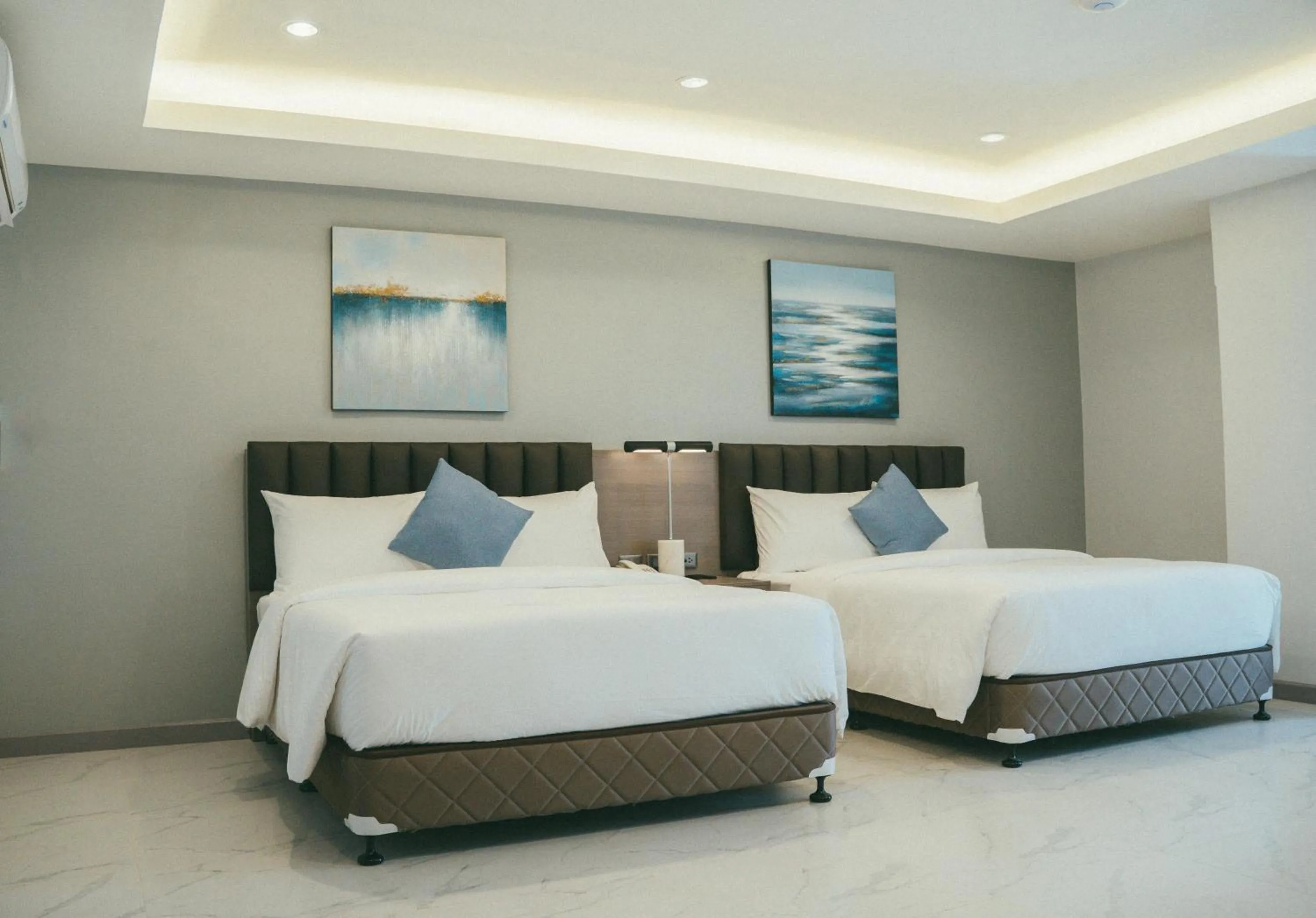 Bed in NS Royal Hotel