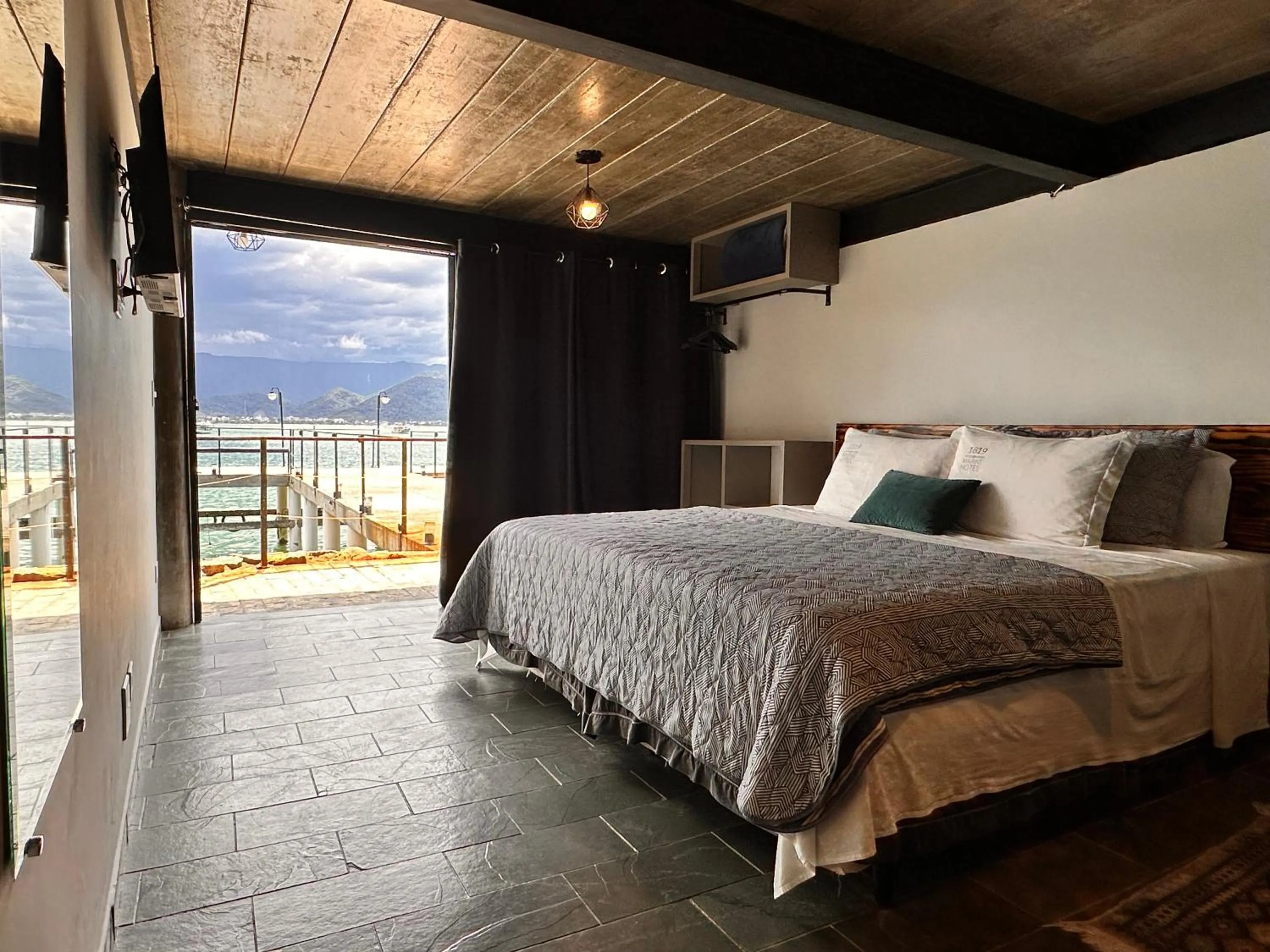 Bed in 1819 Marine Hotel