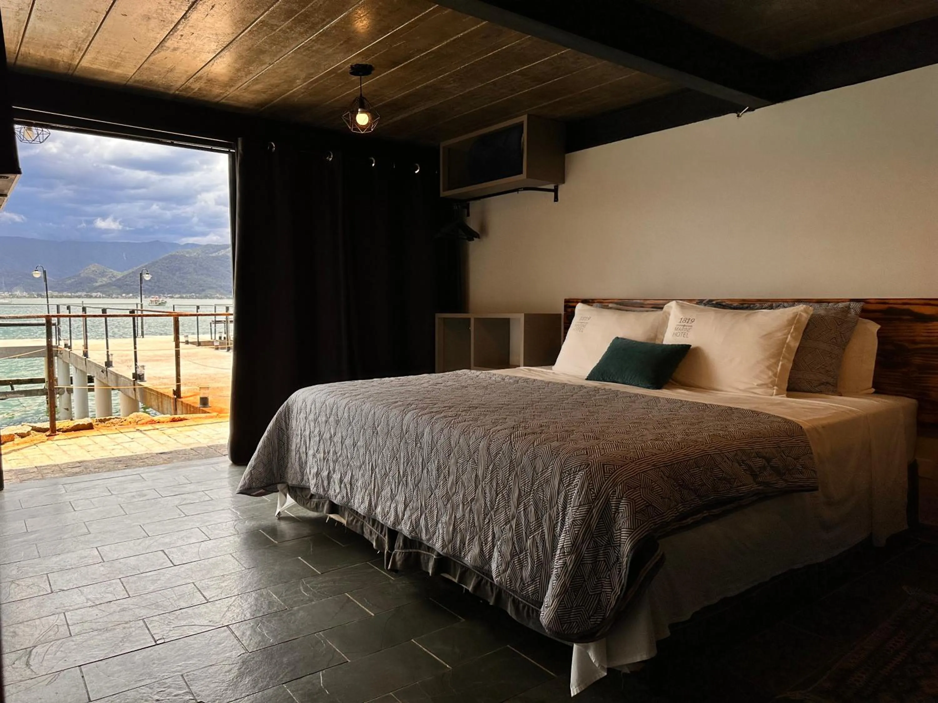 Bed in 1819 Marine Hotel