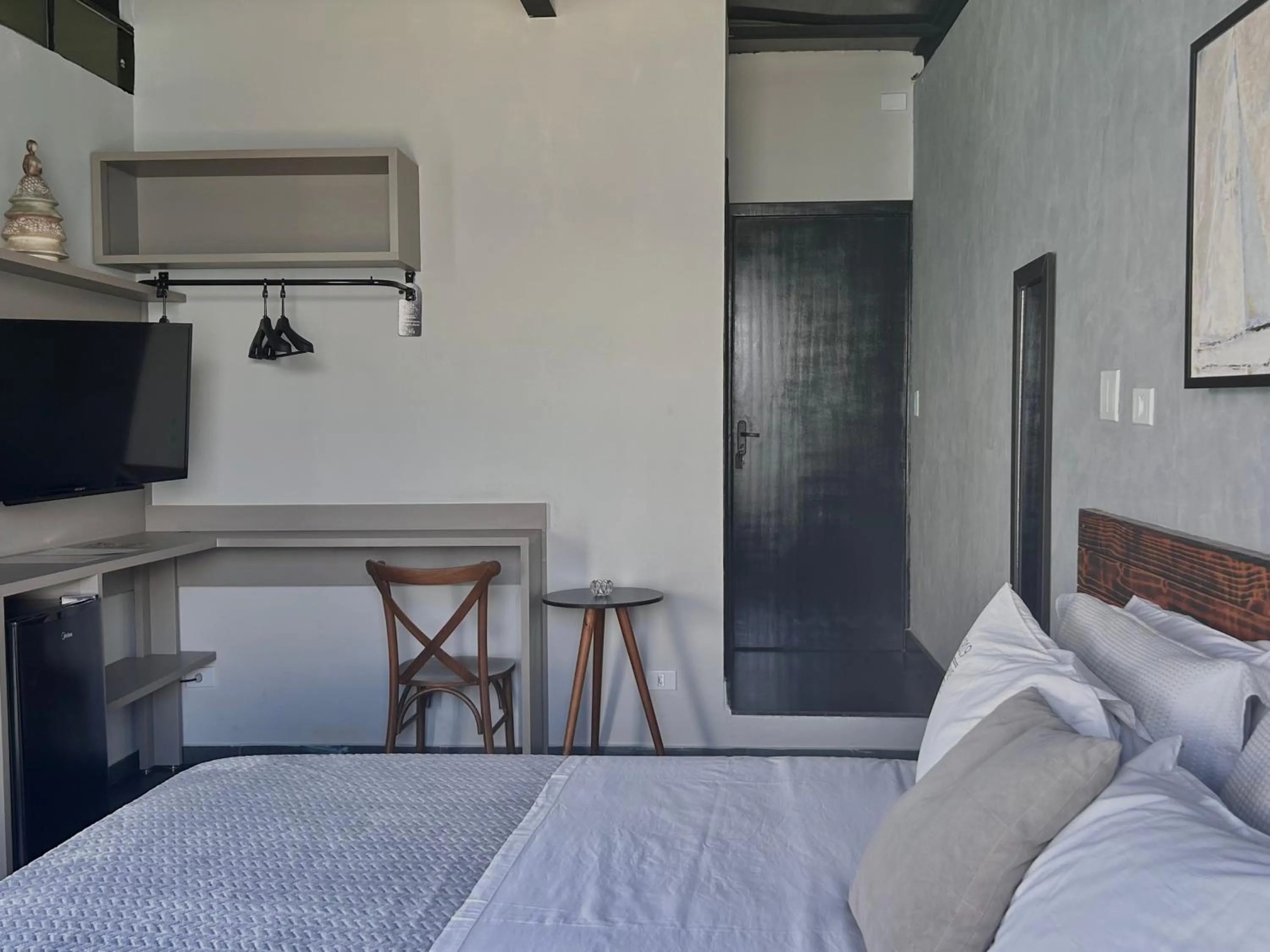 Bed in 1819 Marine Hotel