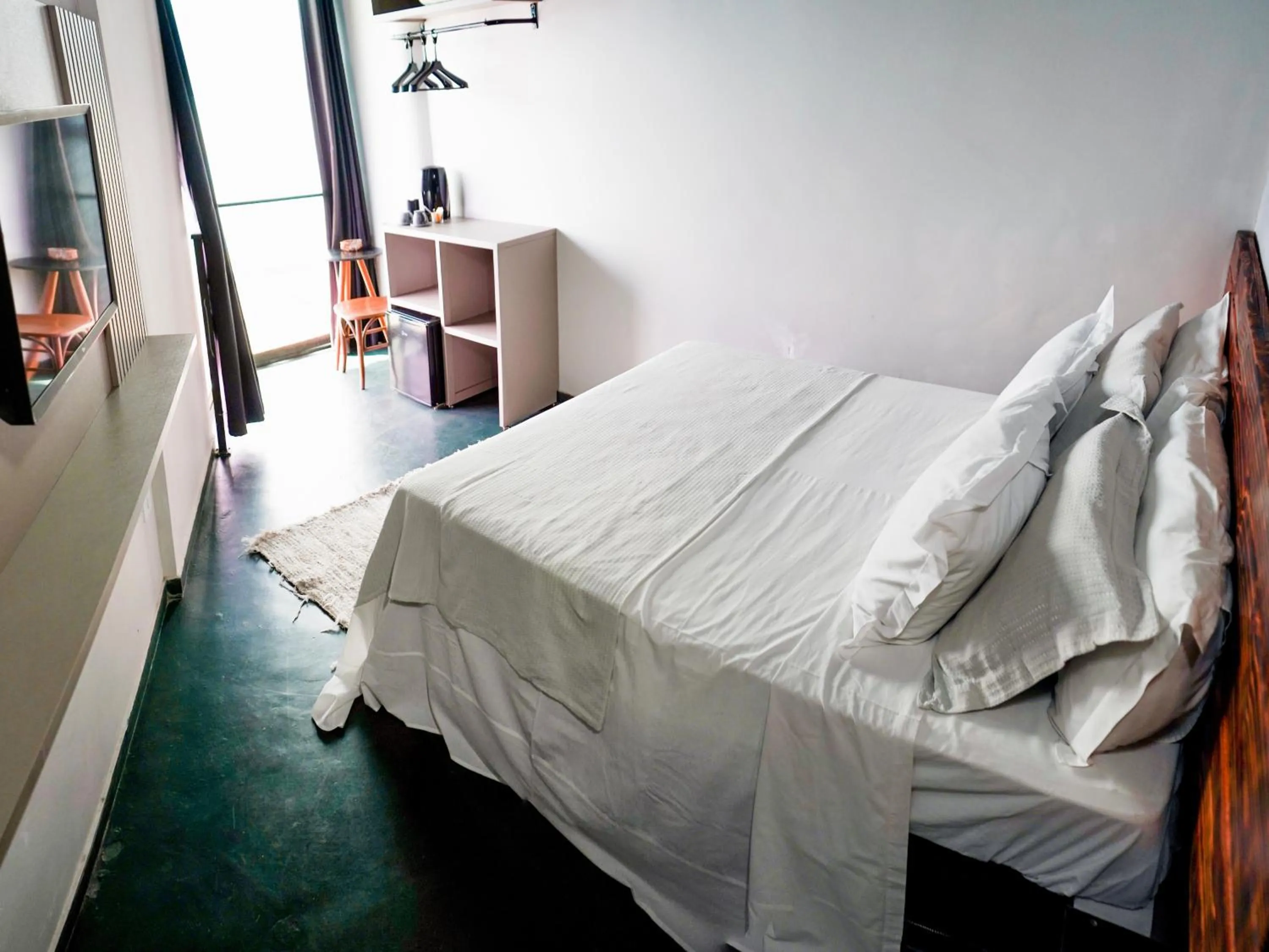 Bed in 1819 Marine Hotel