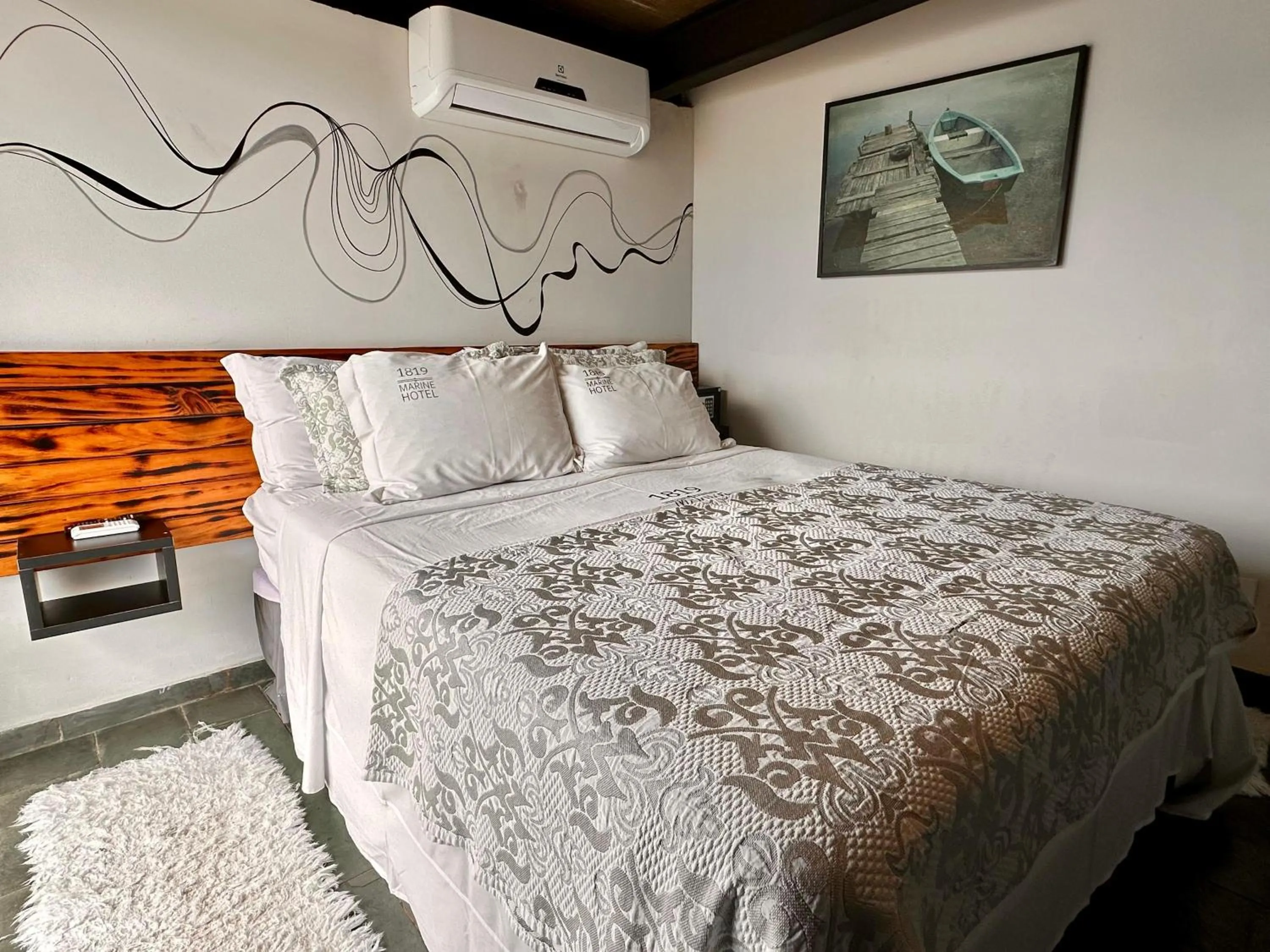 Bed in 1819 Marine Hotel