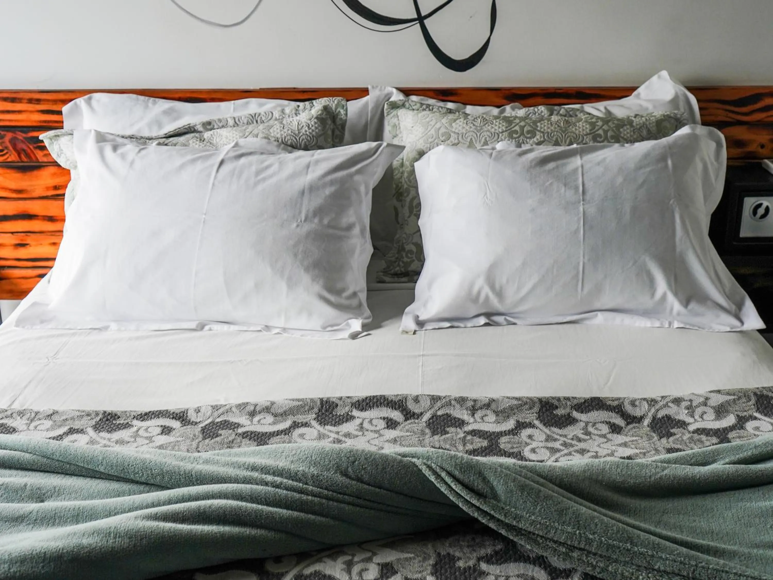 Bed in 1819 Marine Hotel