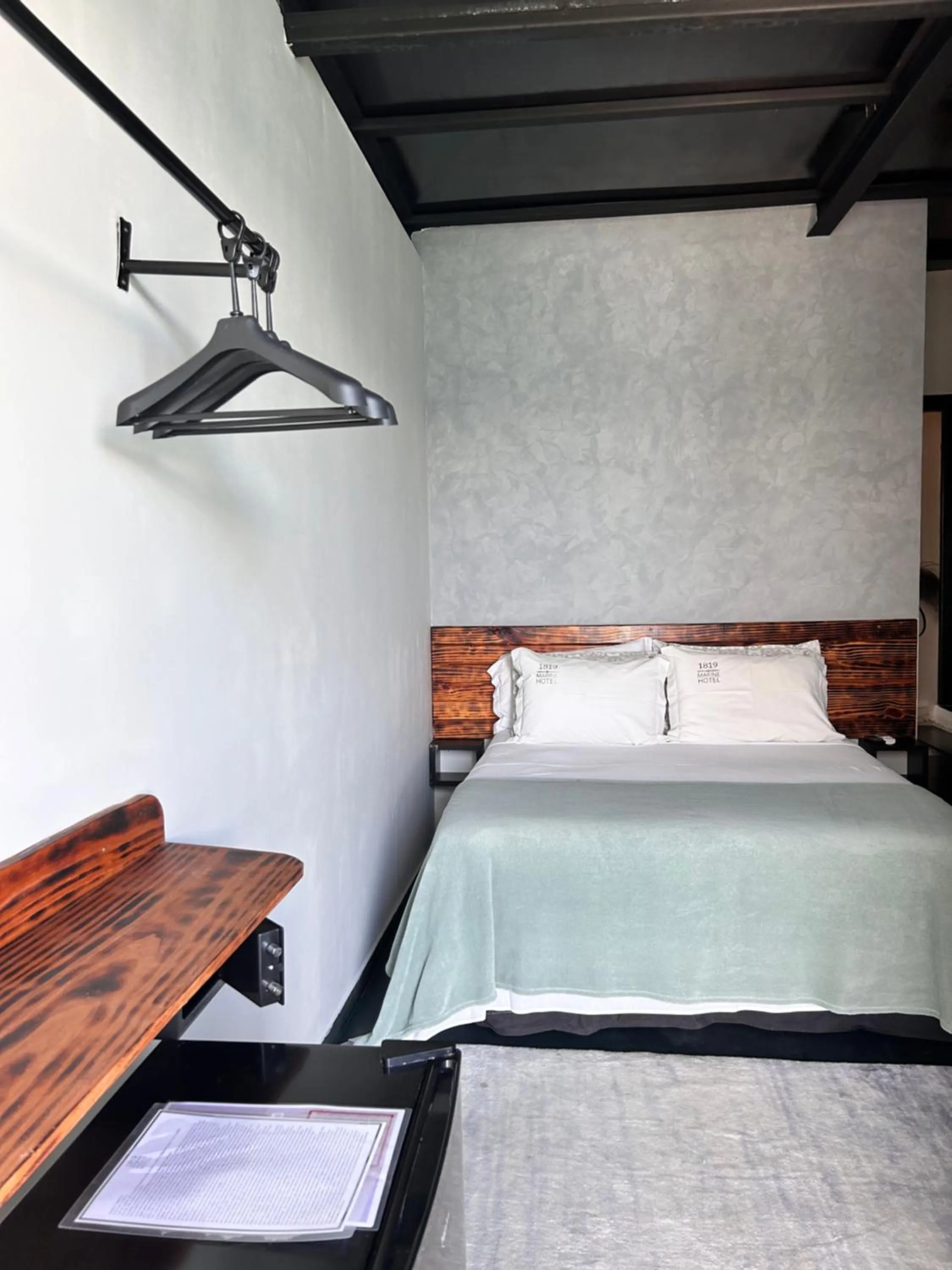 Bed in 1819 Marine Hotel