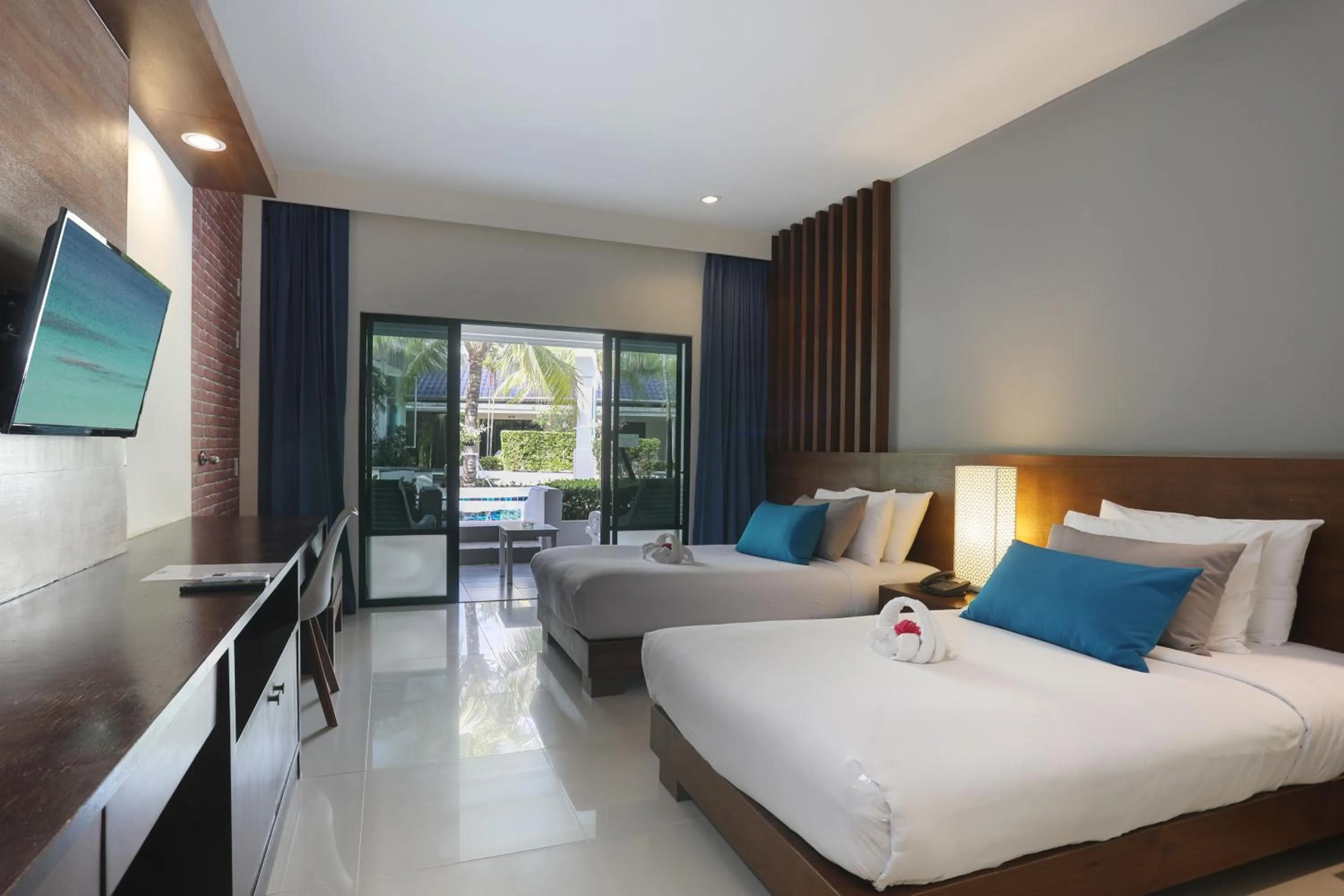 Bed in Tuana Hotels Brook Pool Access