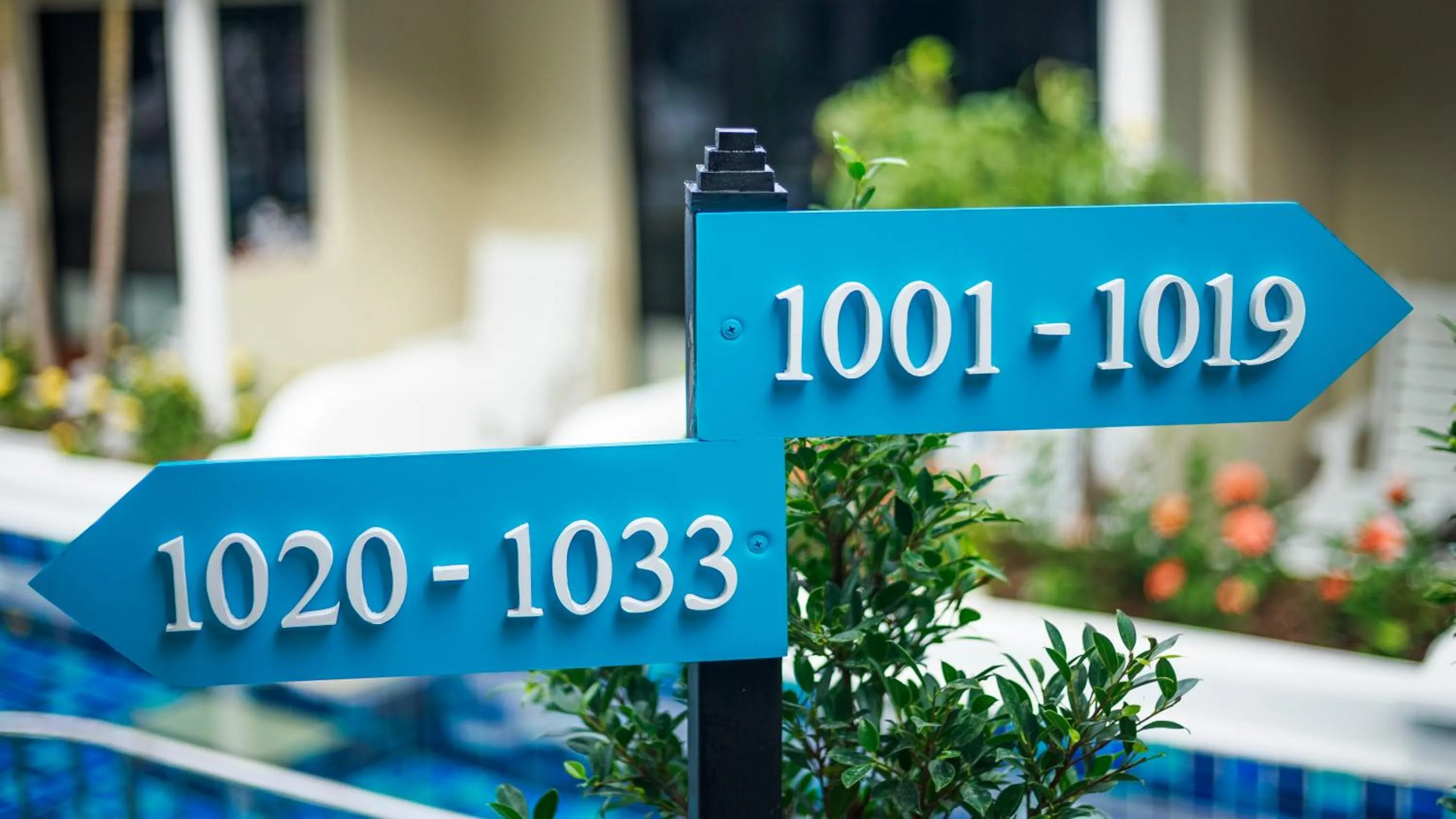 Property logo or sign in Brook Resort & Villas