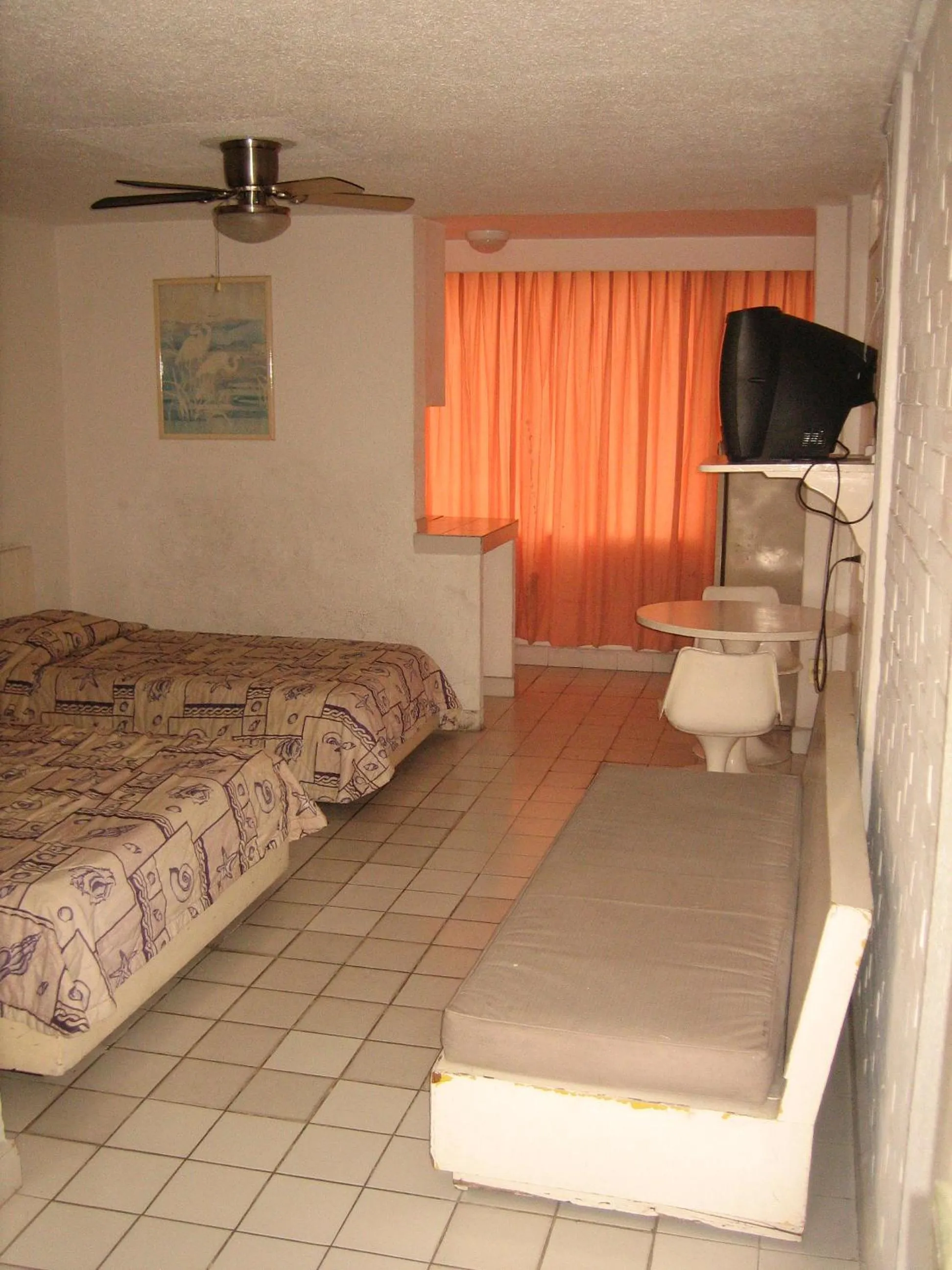 Bed in Hotel Delfines Acapulco by NG Hoteles