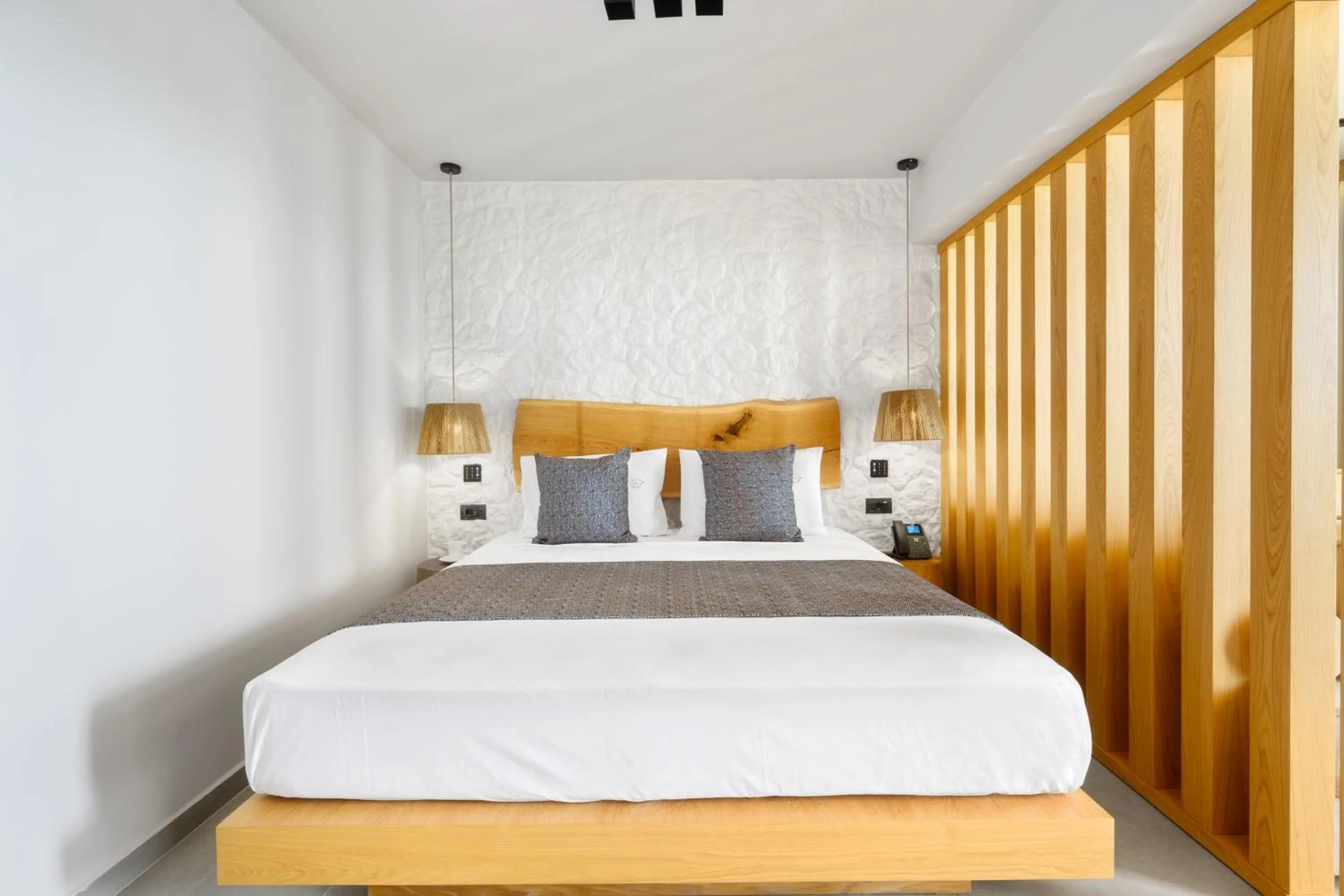 Bed in Emily's Luxury Suites