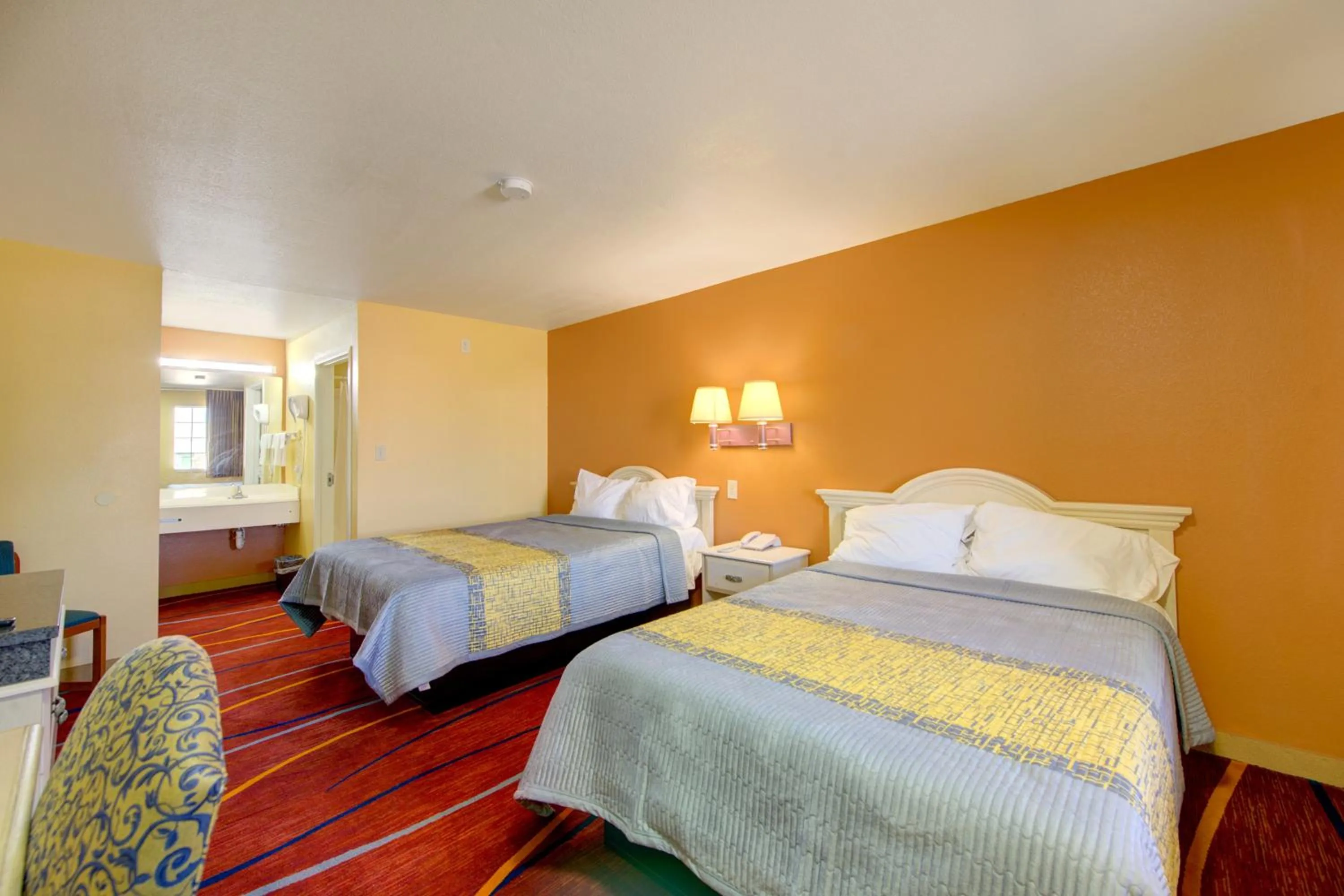 Bedroom, Bed in Heights Inn by Townhouse Harker Heights Killeen