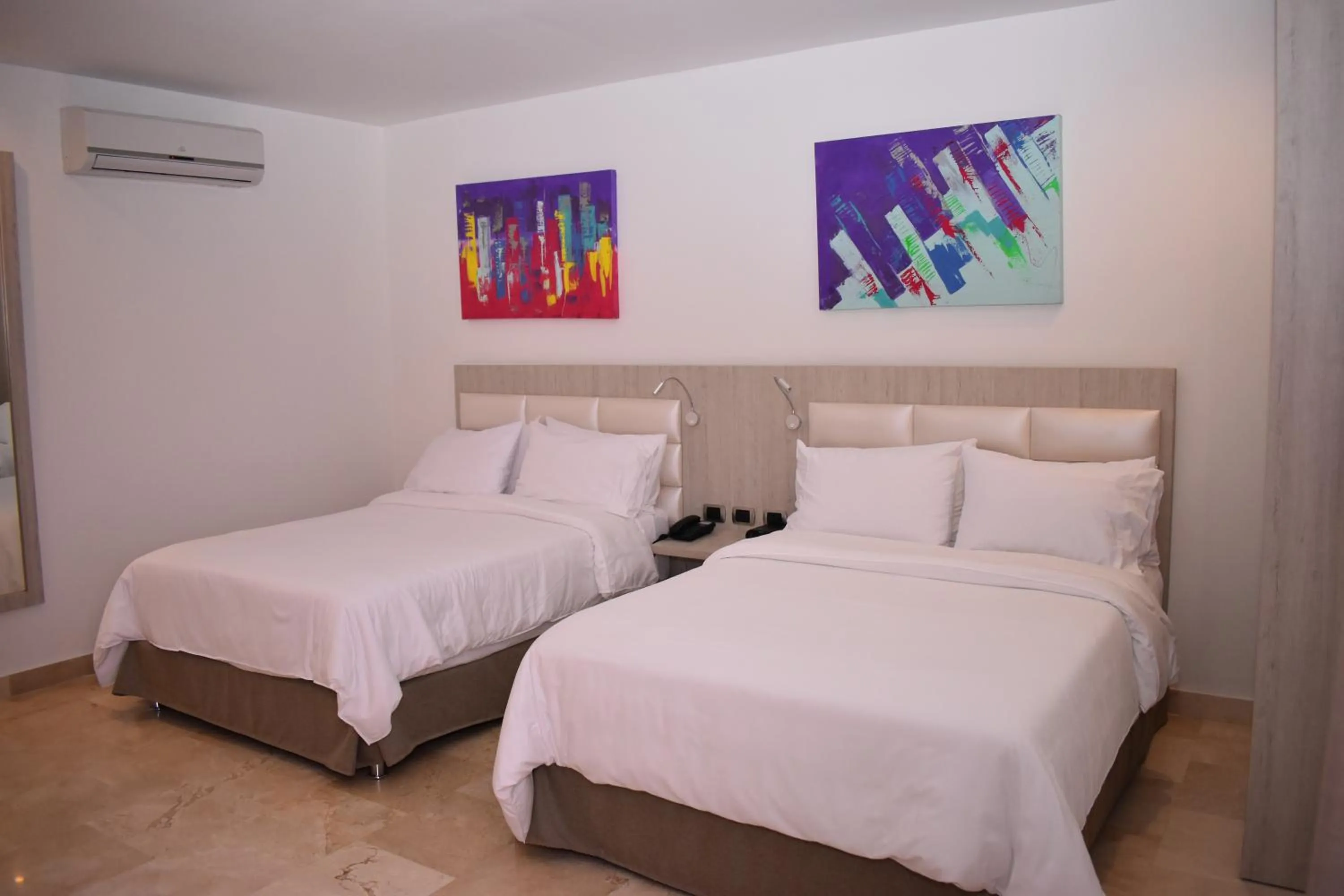 Photo of the whole room, Bed in Radisson Diamond Barranquilla