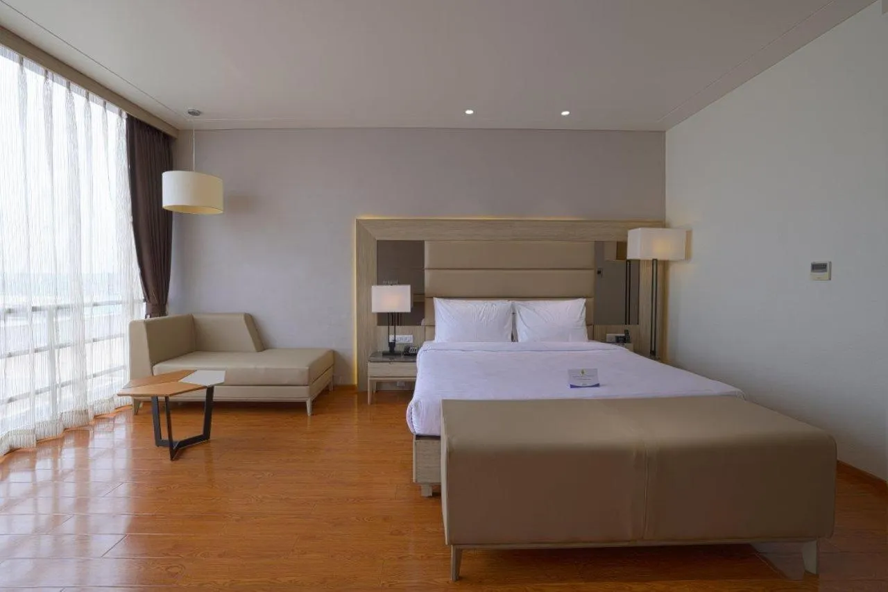 Bed in Sarovar Portico Morbi