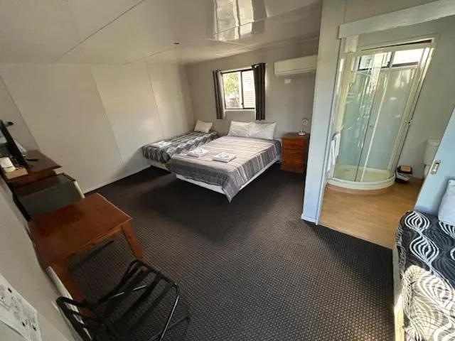 Bed in Coal n Cattle Hotel Motel