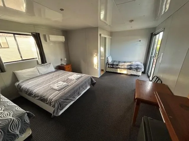 Bed in Coal n Cattle Hotel Motel