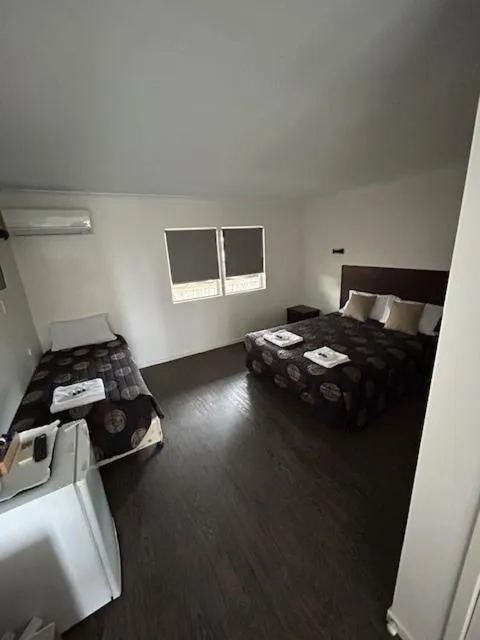 Bed in Coal n Cattle Hotel Motel