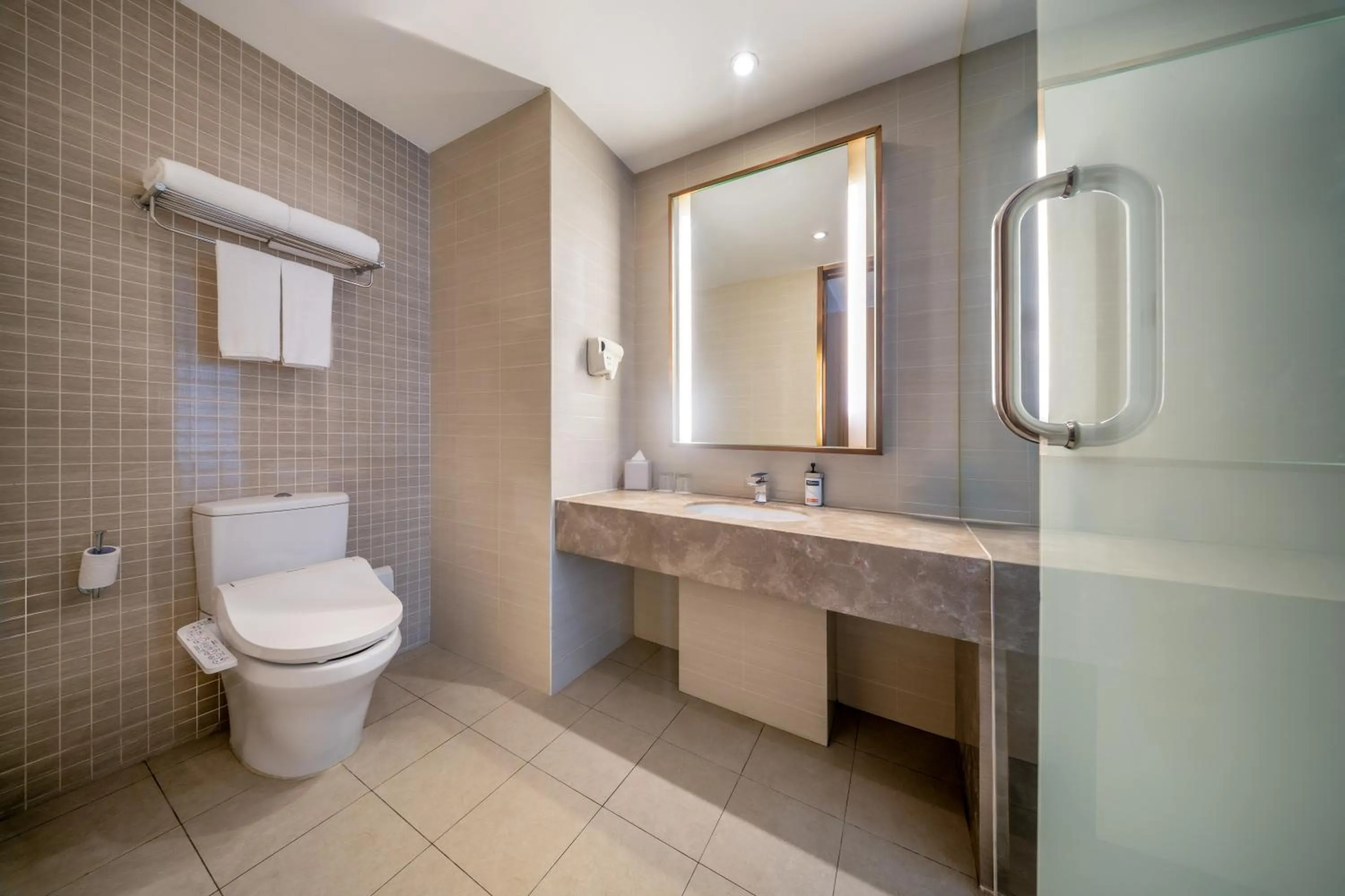 Toilet in Holiday Inn Express Shenyang Golden Corridor by IHG