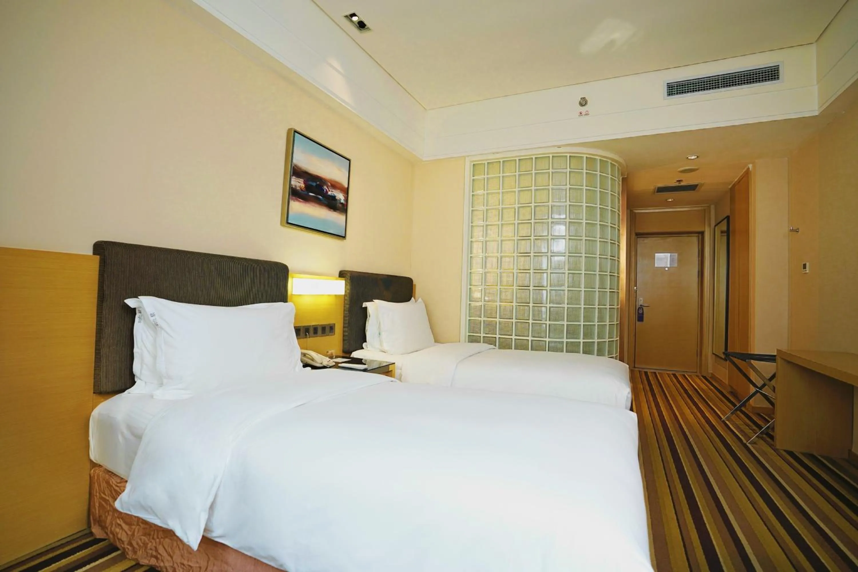 Bedroom, Bed in Holiday Inn Express Shenyang Golden Corridor by IHG