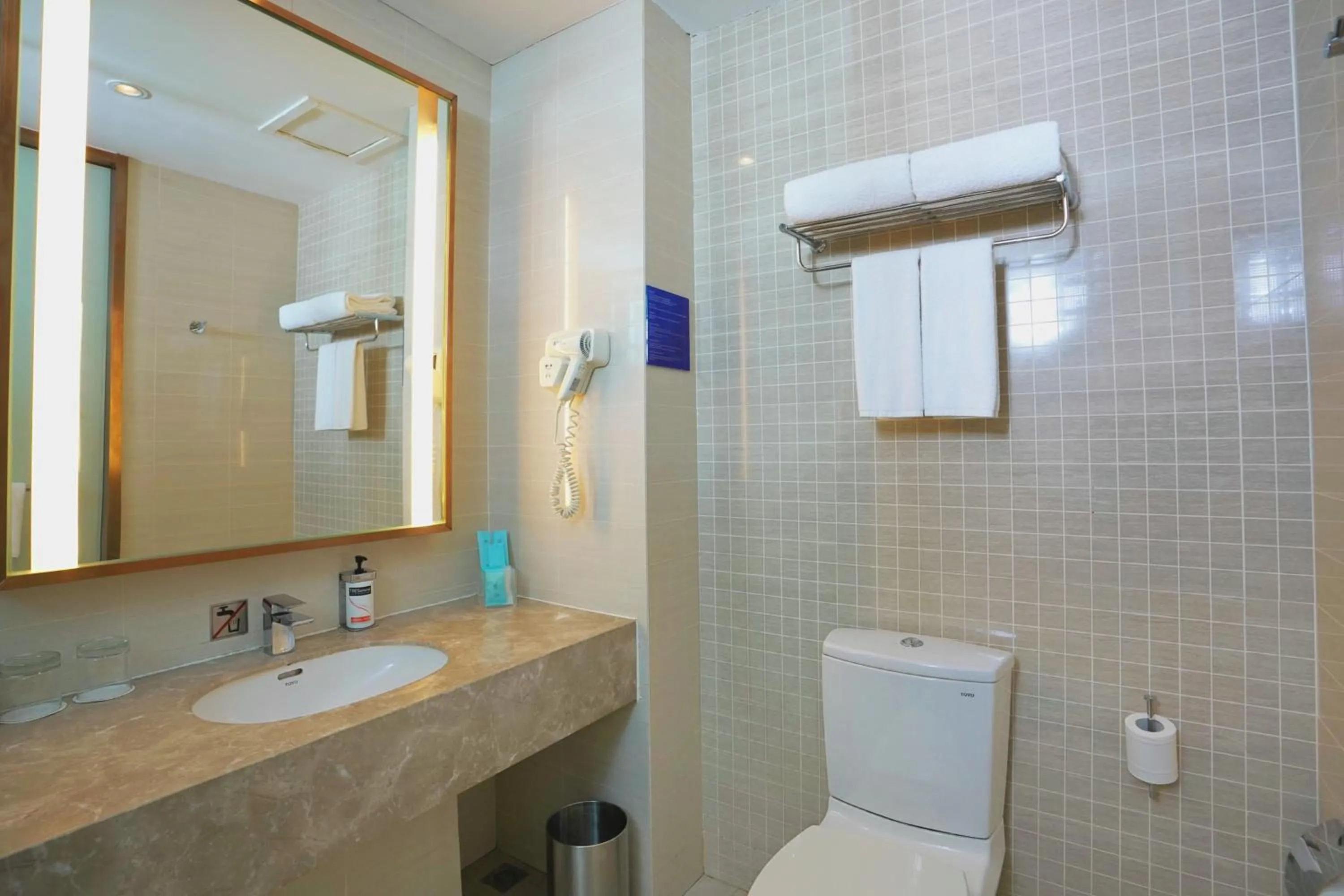 Bathroom in Holiday Inn Express Shenyang Golden Corridor by IHG