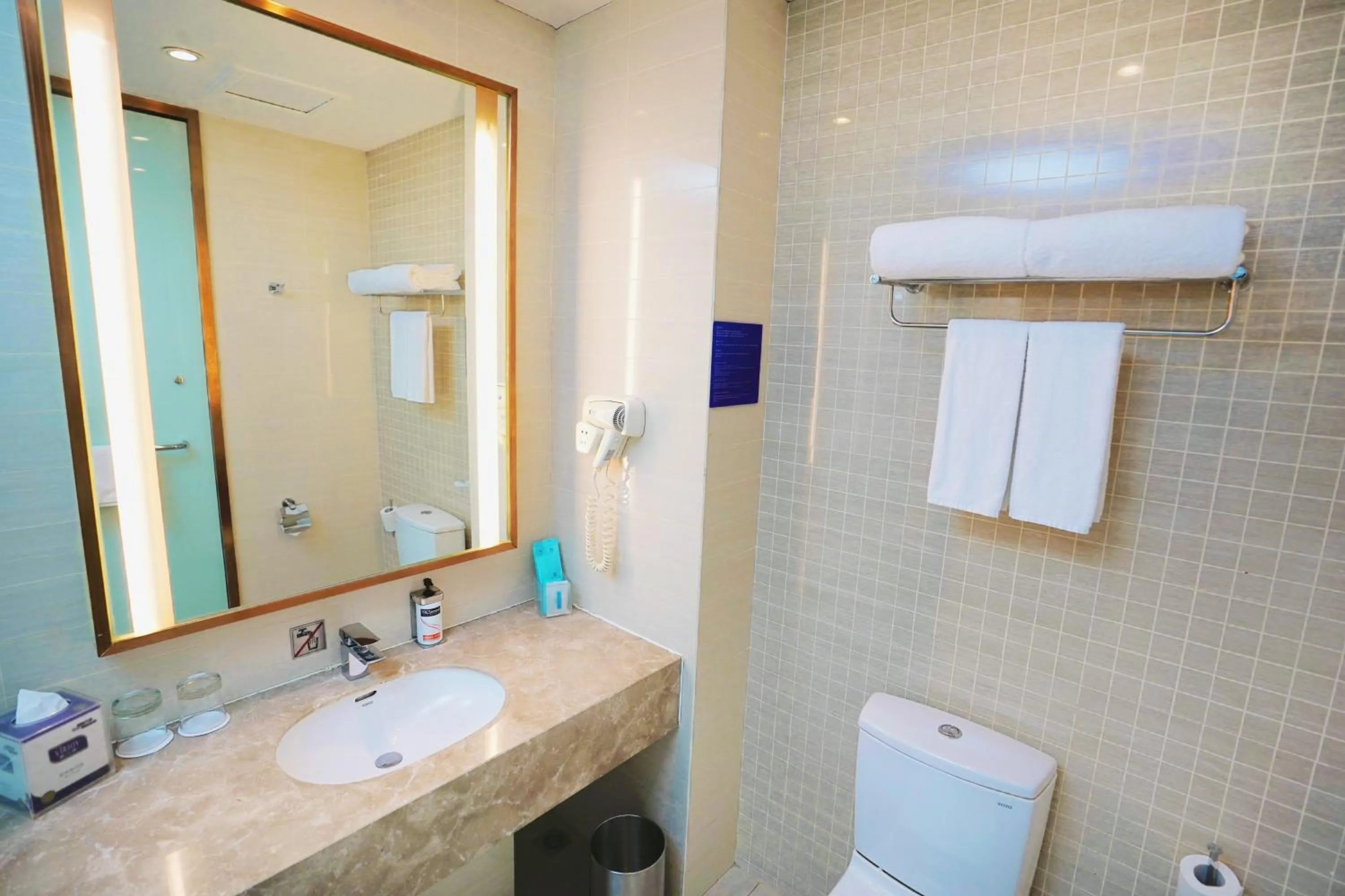 Bathroom in Holiday Inn Express Shenyang Golden Corridor by IHG