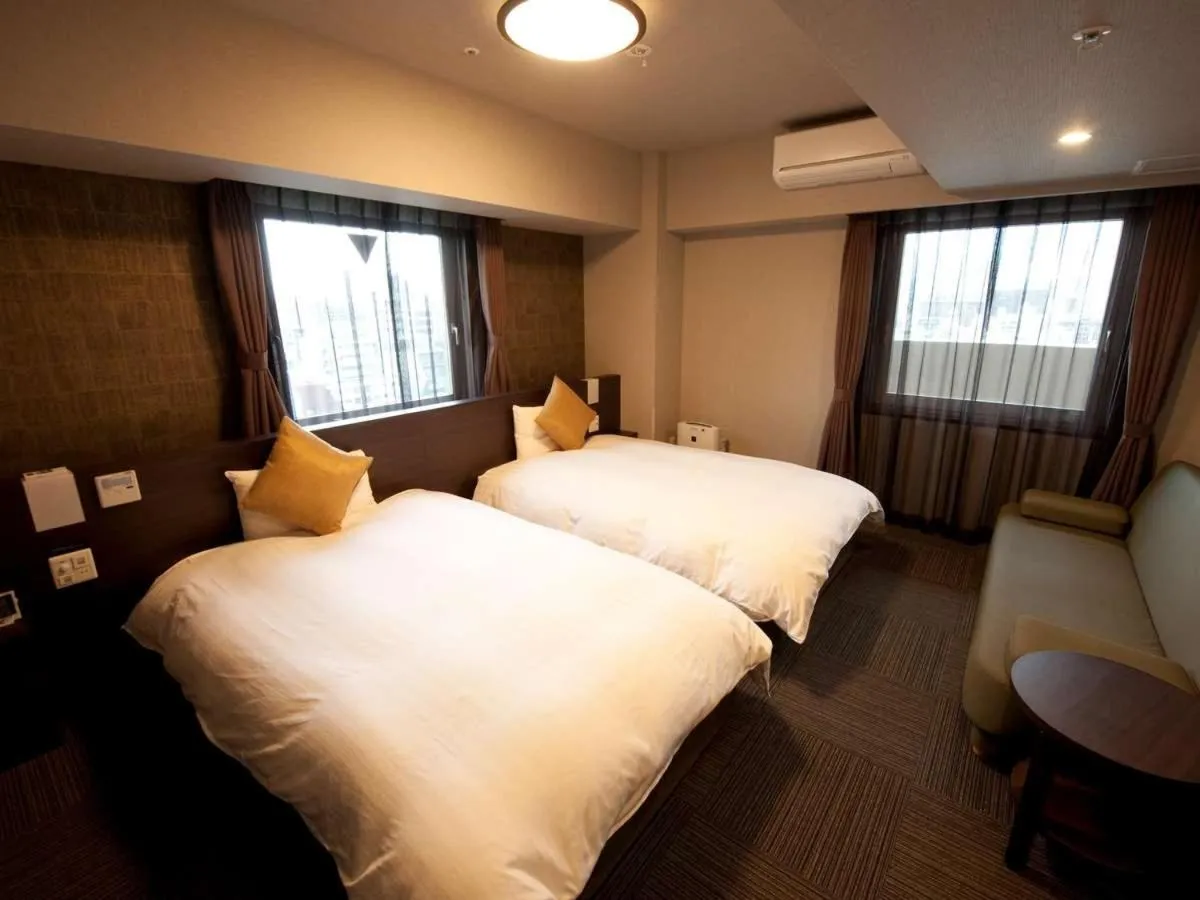 Bed in Dormy Inn Premium Namba Natural Hot Spring