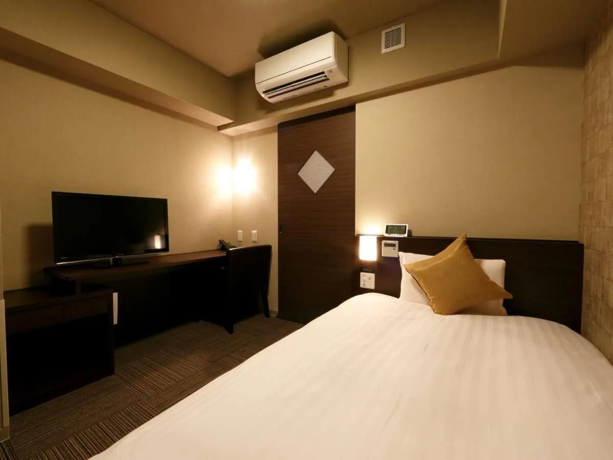 Bed in Dormy Inn Premium Namba Natural Hot Spring