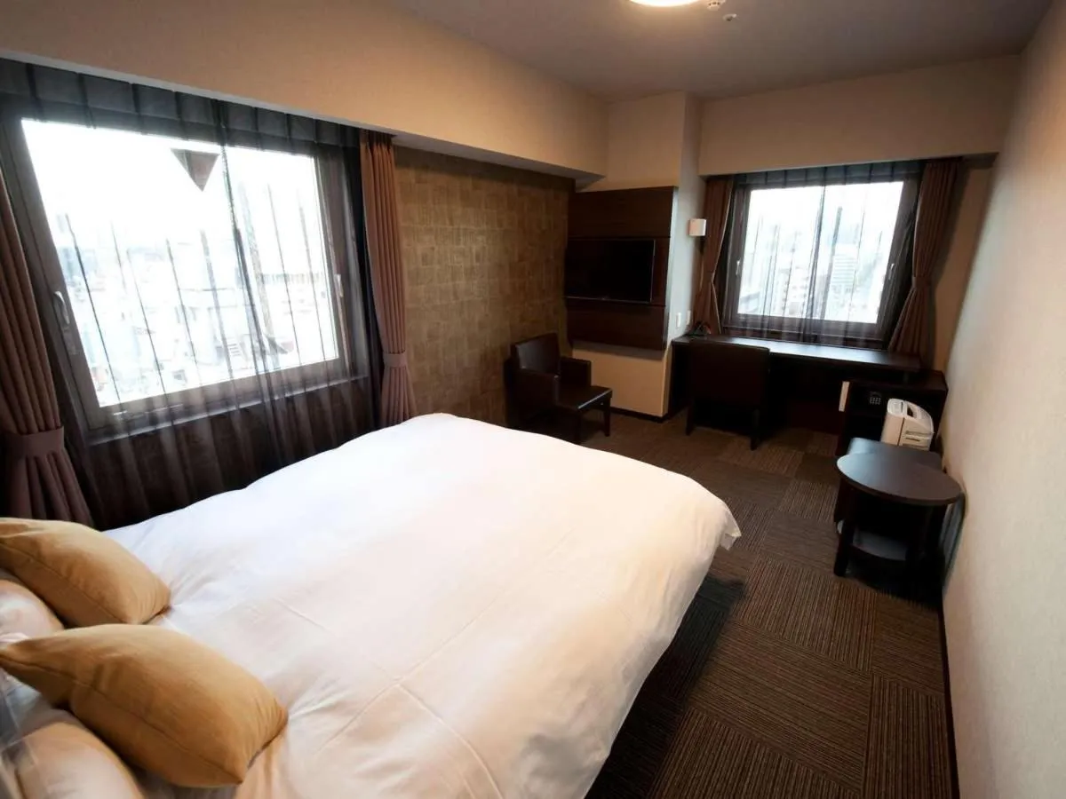 Bed in Dormy Inn Premium Namba Natural Hot Spring