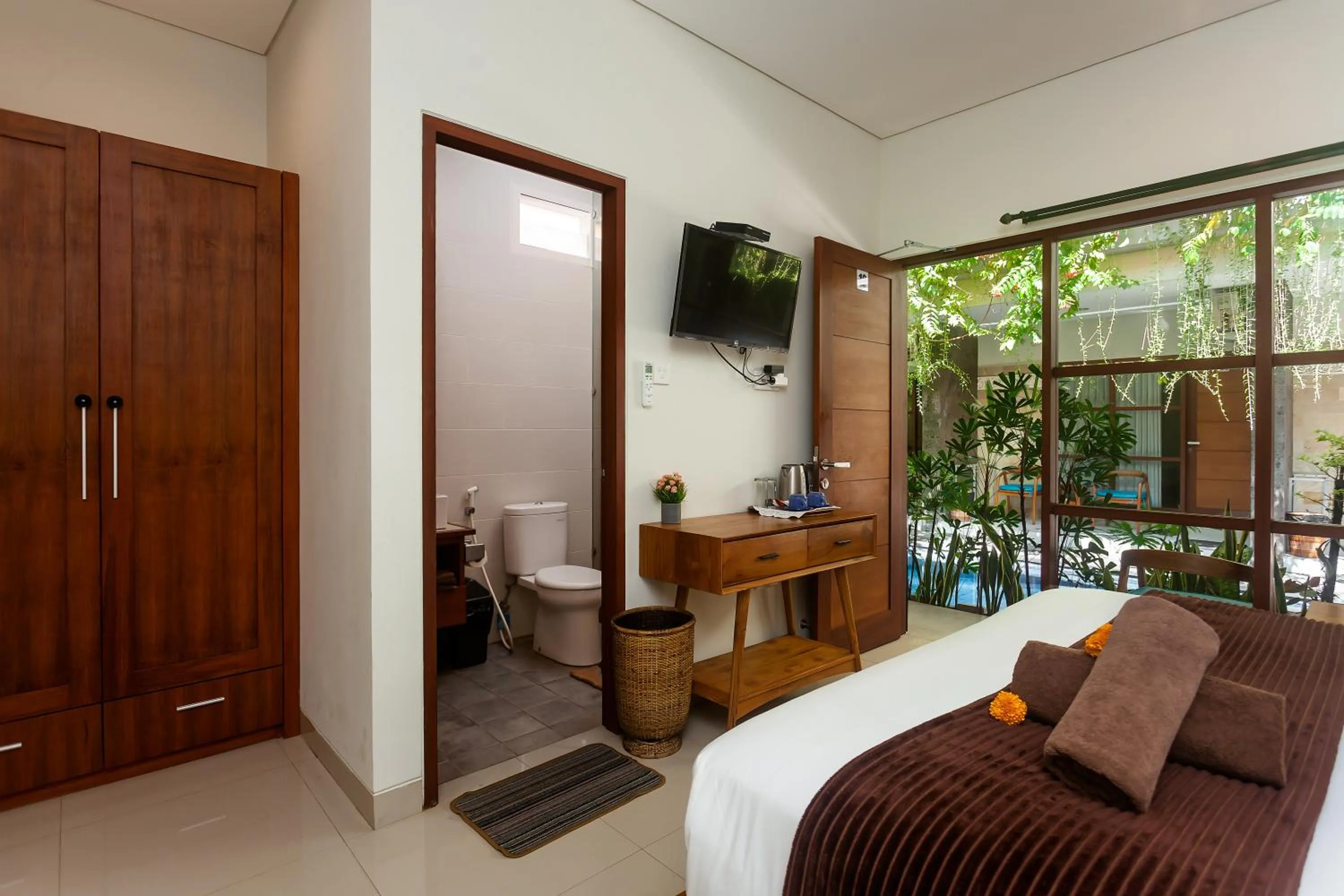 Bed in Naksa Homestay Sanur