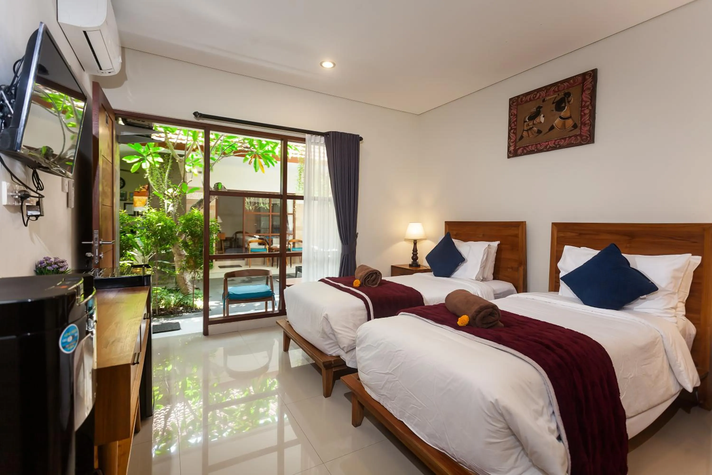 Bed in Naksa Homestay Sanur