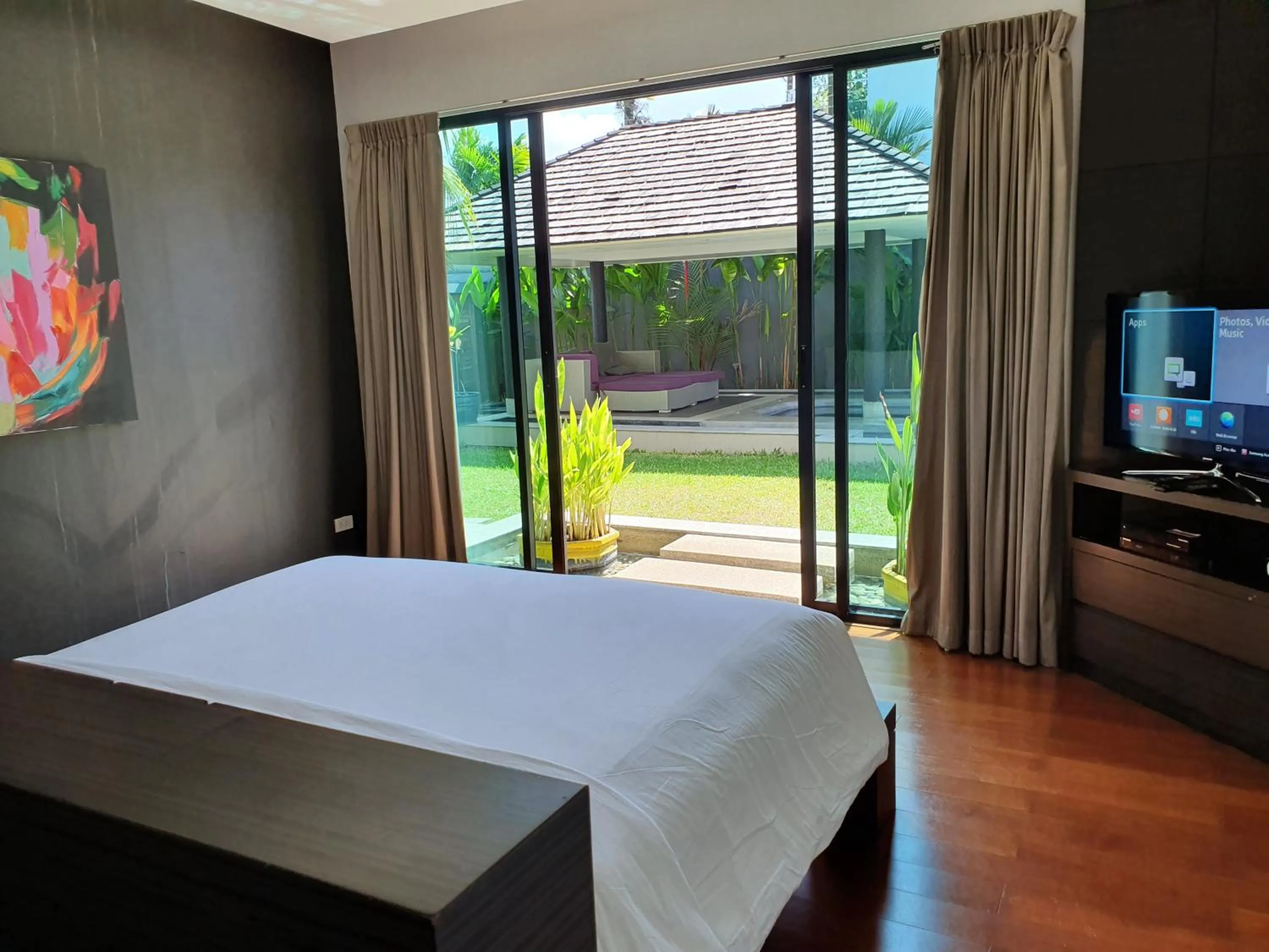 Pool view, Bed in Eden Villa Phuket