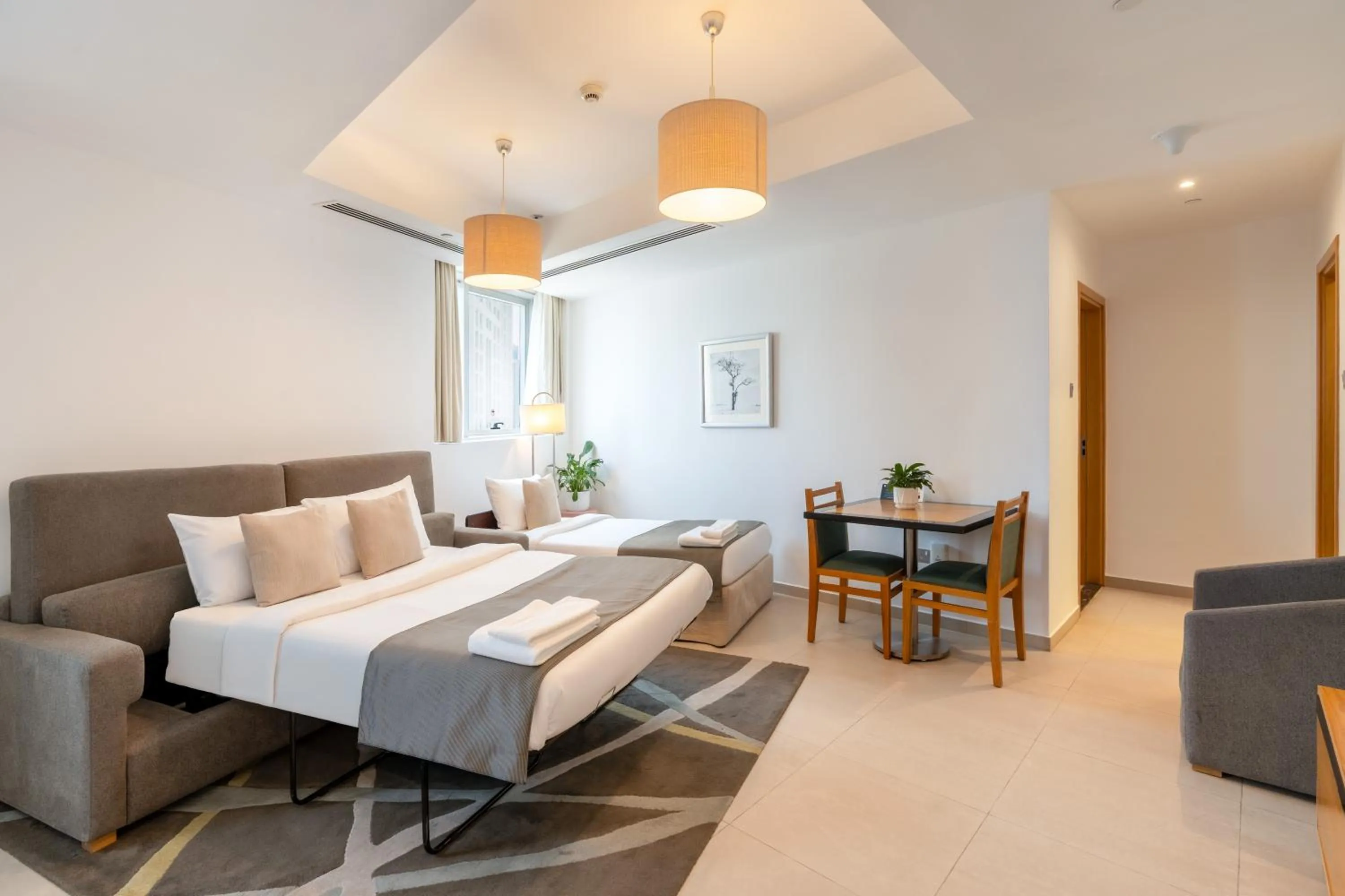 Bed in Grand Heights Dubai Hotel Apartments