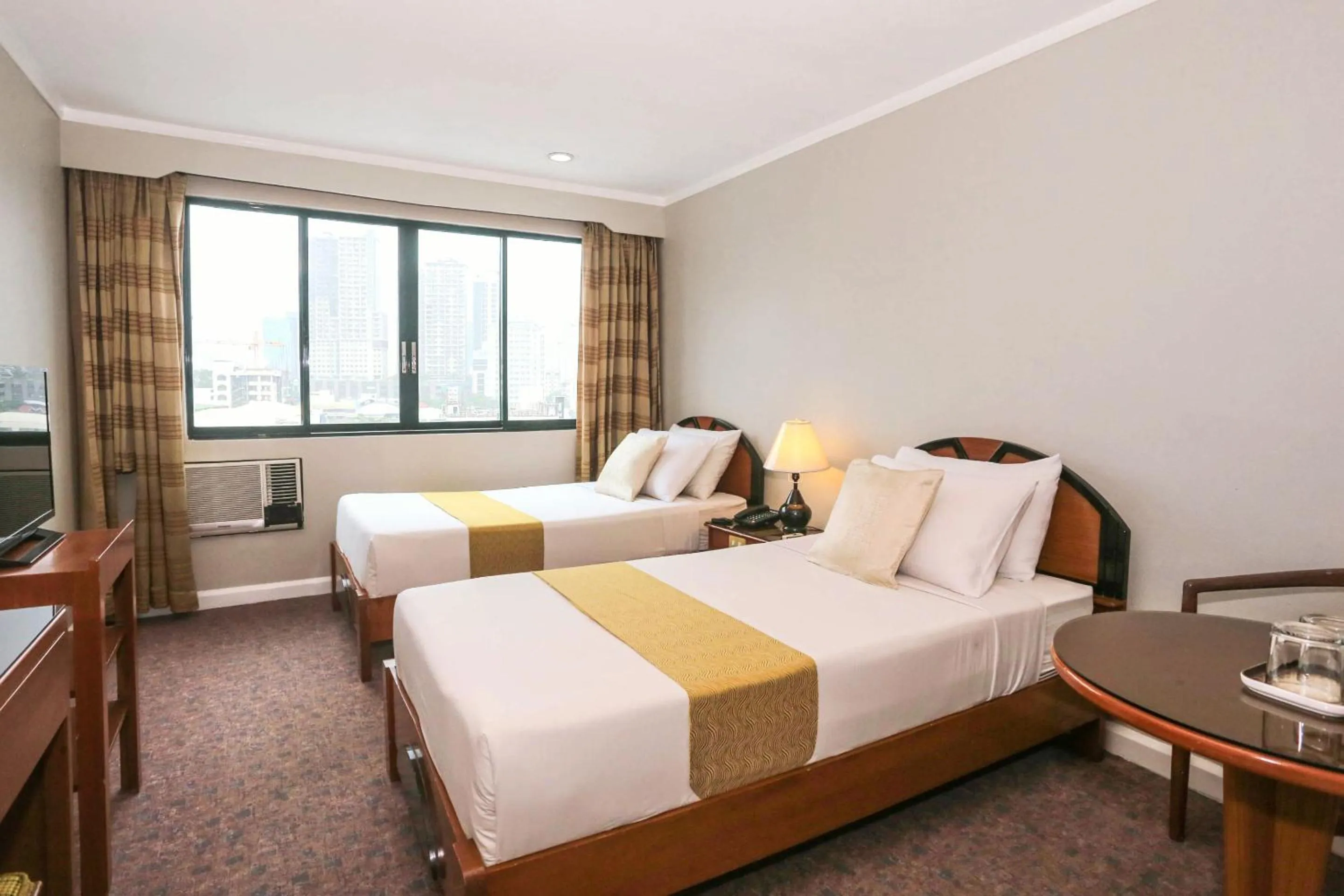 Bedroom, Bed in Holiday Plaza Hotel - Cebu