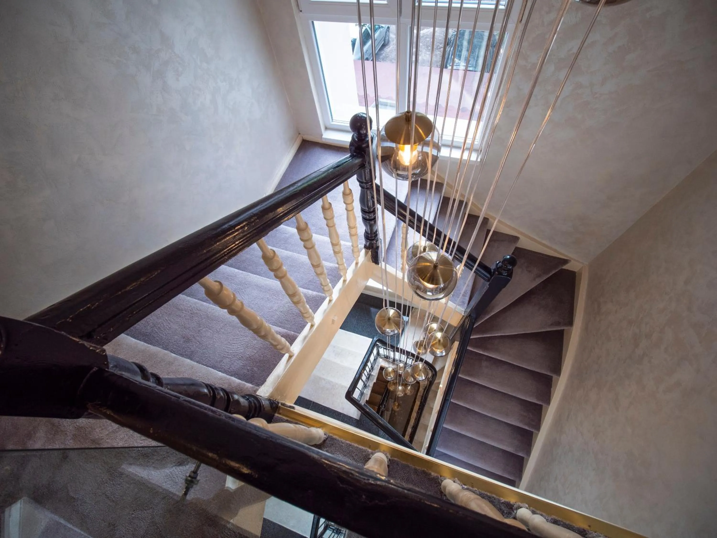 Communal lounge/ TV room in The Moon Boutique Hotel