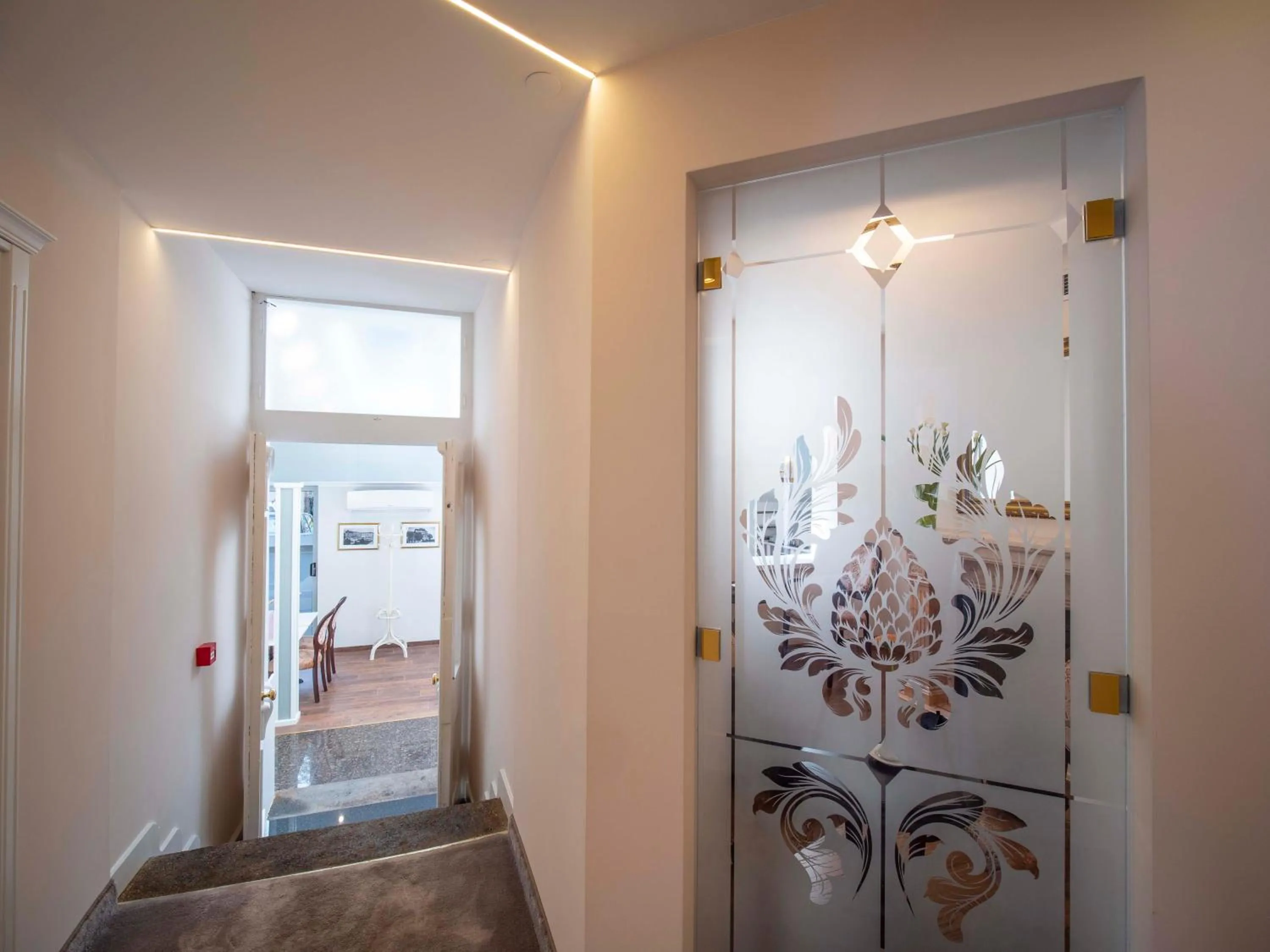 Communal lounge/ TV room in The Moon Boutique Hotel