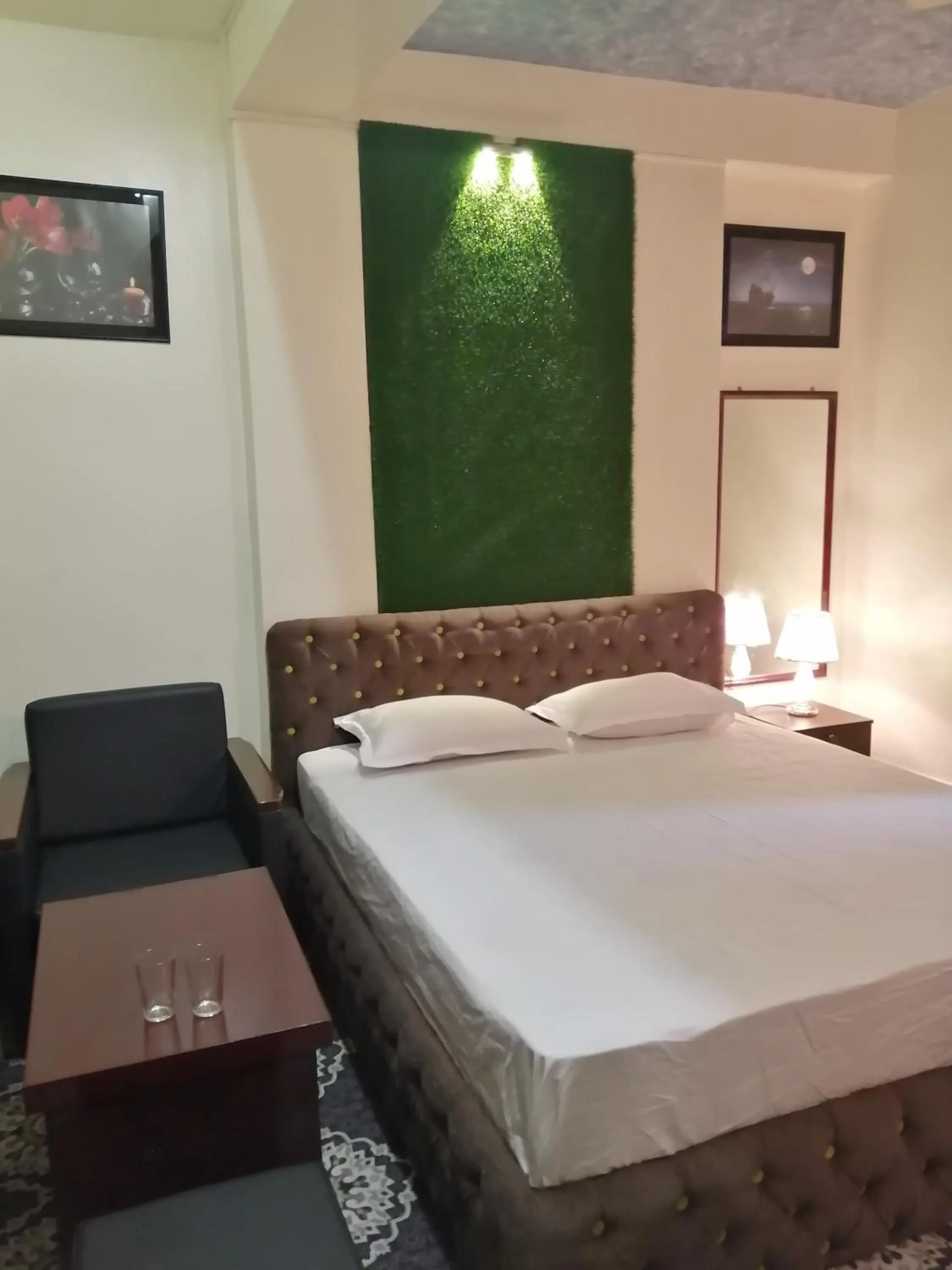Bed in Hotel Hoque Tower International