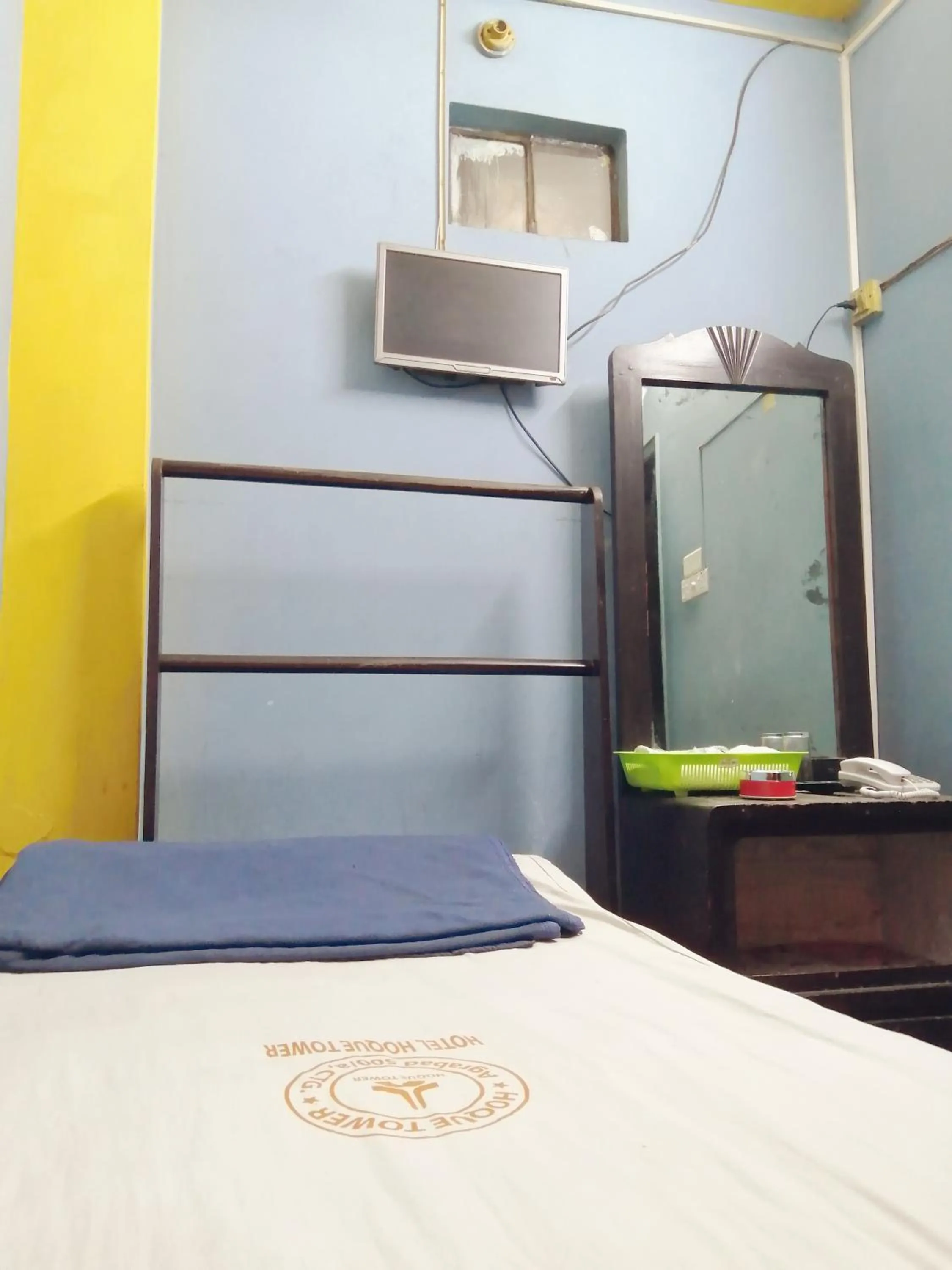 Bed in Hotel Hoque Tower International