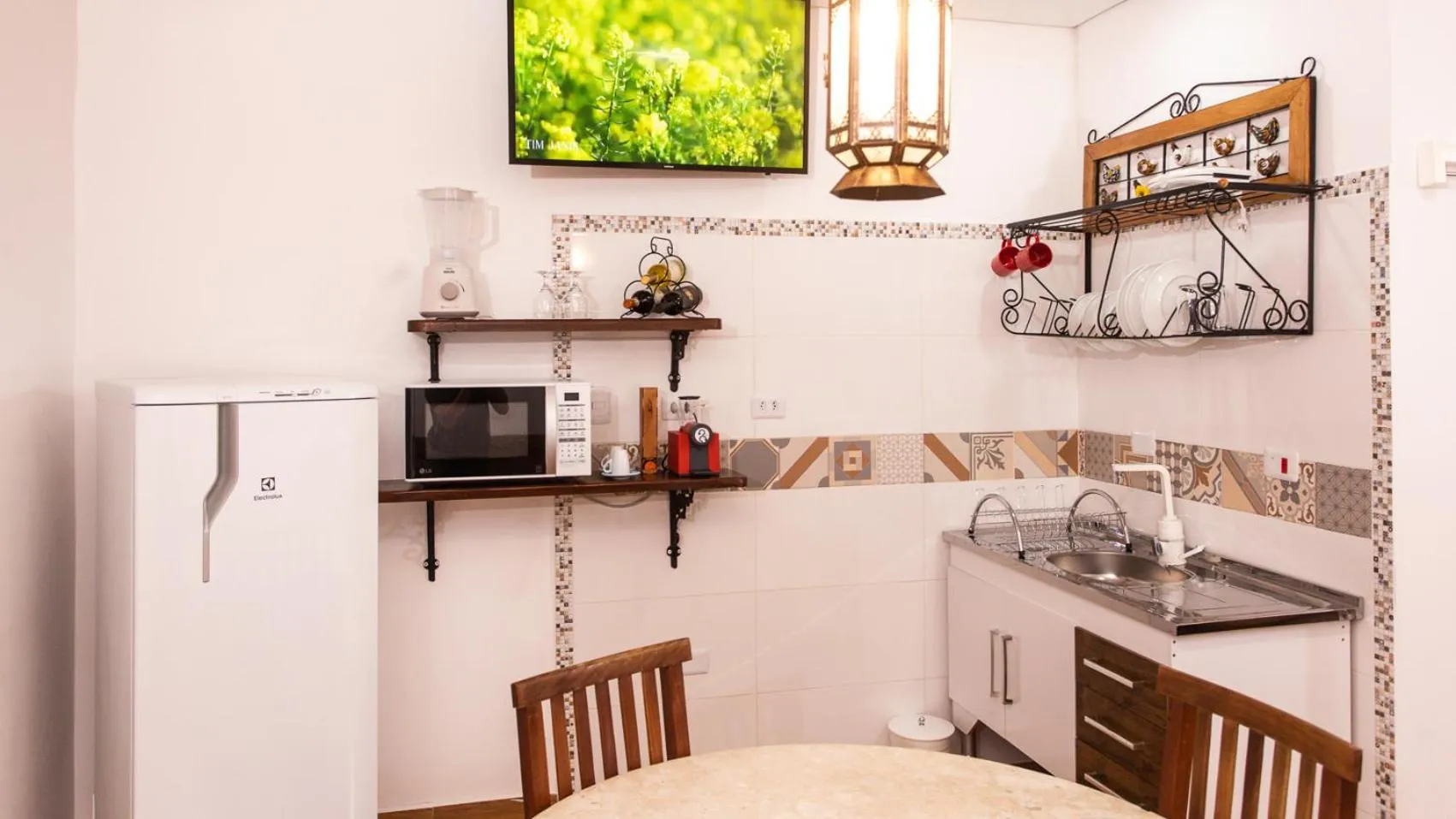 Kitchen or kitchenette in Hotel Chalet Monet - Granja Vianna