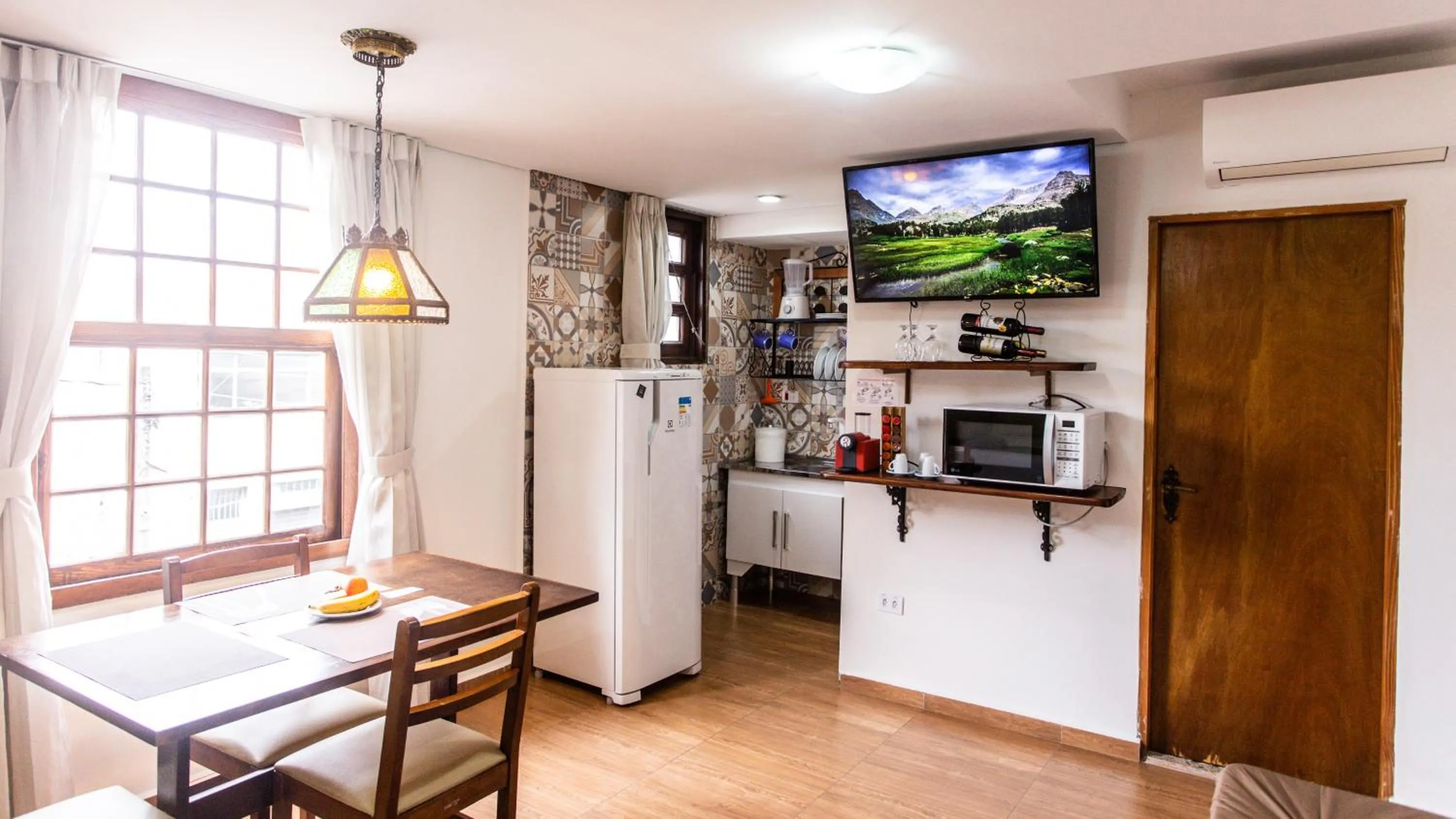 Kitchen or kitchenette in Hotel Chalet Monet - Granja Vianna