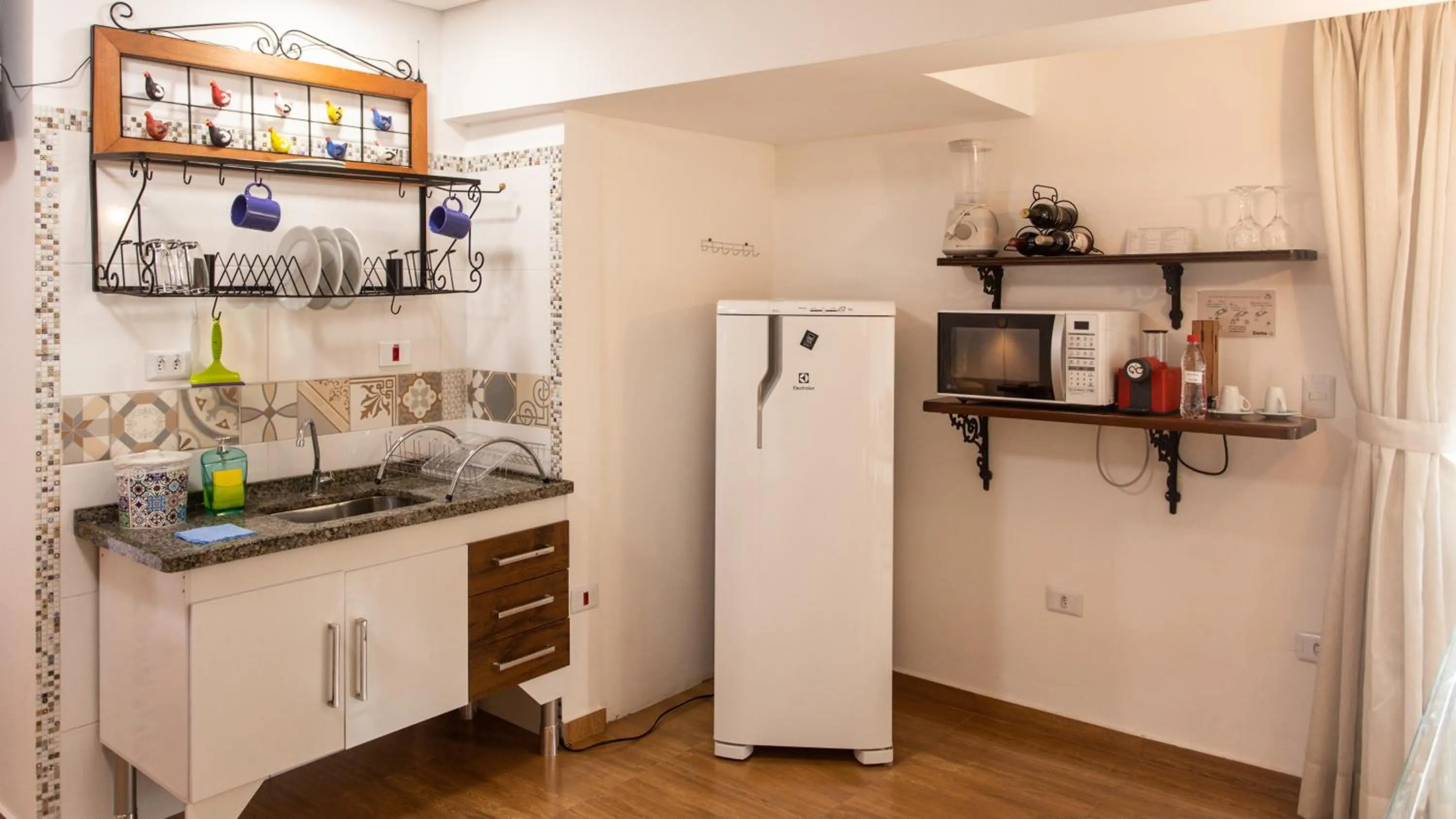 Kitchen or kitchenette in Hotel Chalet Monet - Granja Vianna