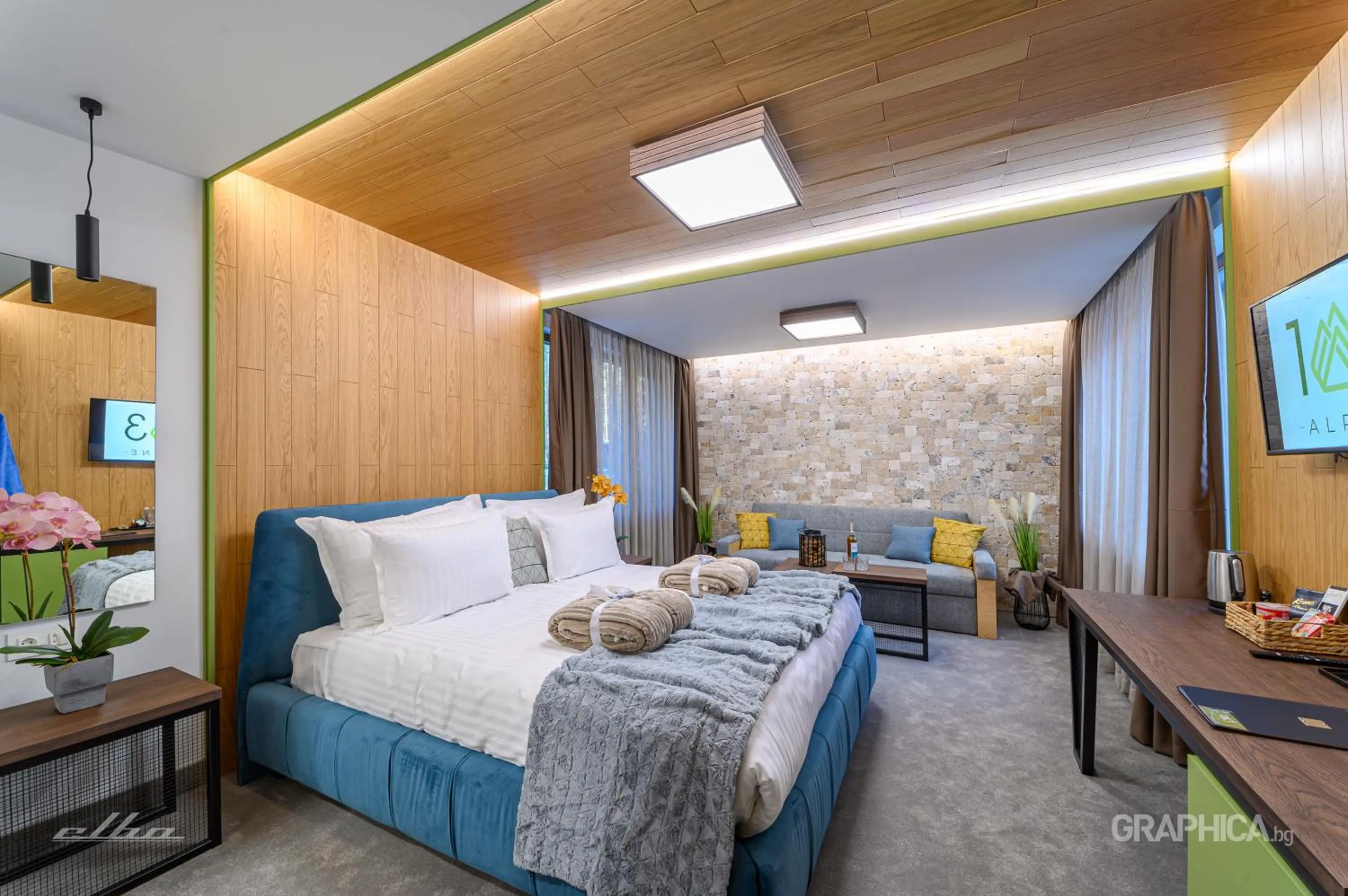 Bed in 103 Alpine Hotel